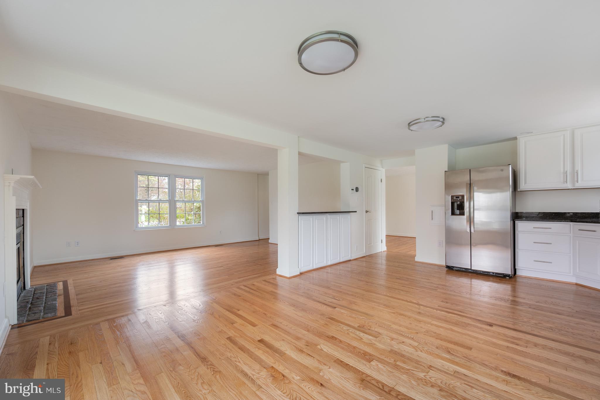 4417 Cub Run Road Chantilly, VA 20151 - Photo 17 of 57 a view of empty room with wooden floor and window