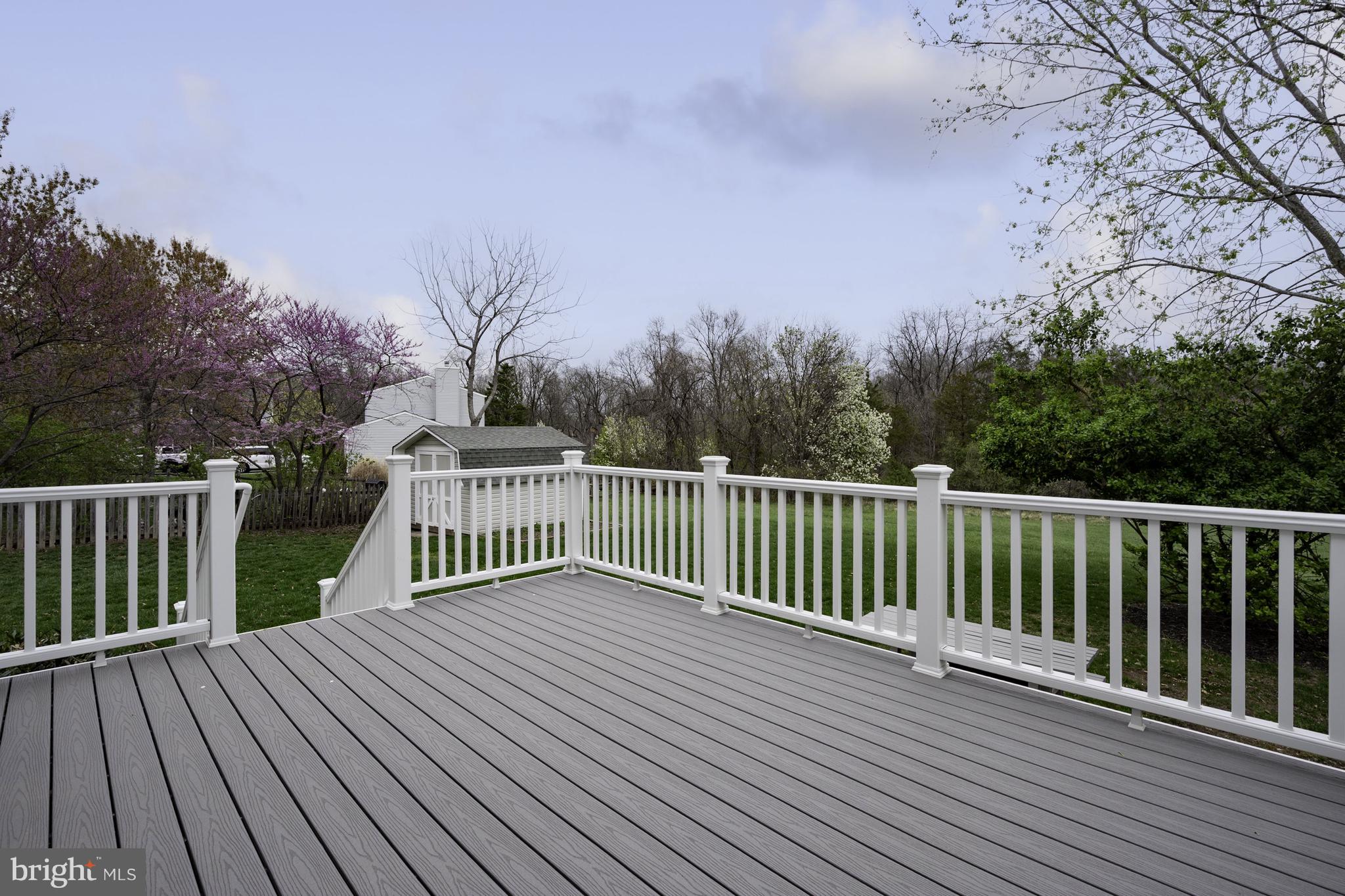 4417 Cub Run Road Chantilly, VA 20151 - Photo 23 of 57 a balcony with wooden floor and fence