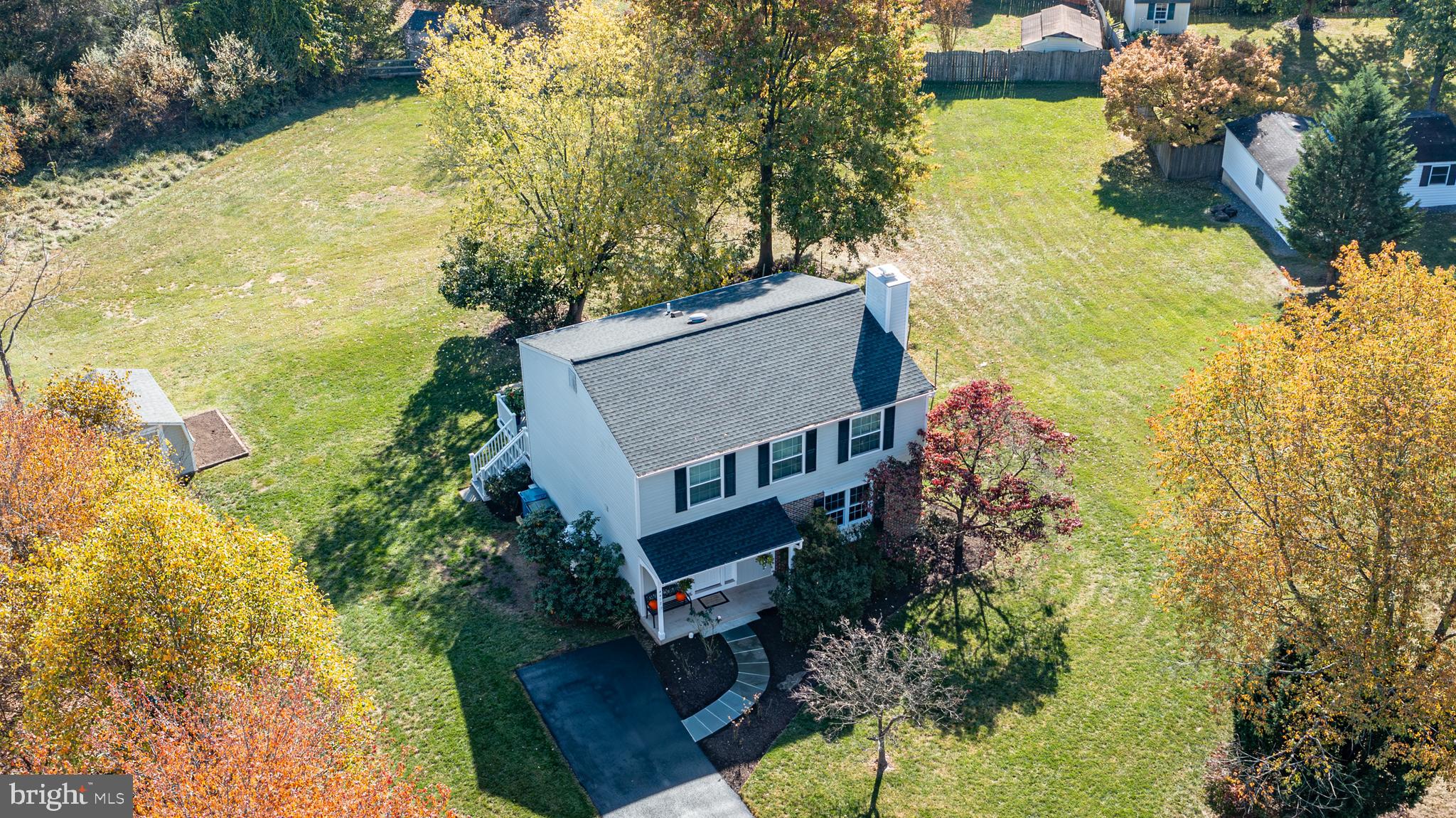 4417 Cub Run Road Chantilly, VA 20151 - Photo 4 of 57 a view of a house with a yard and pool