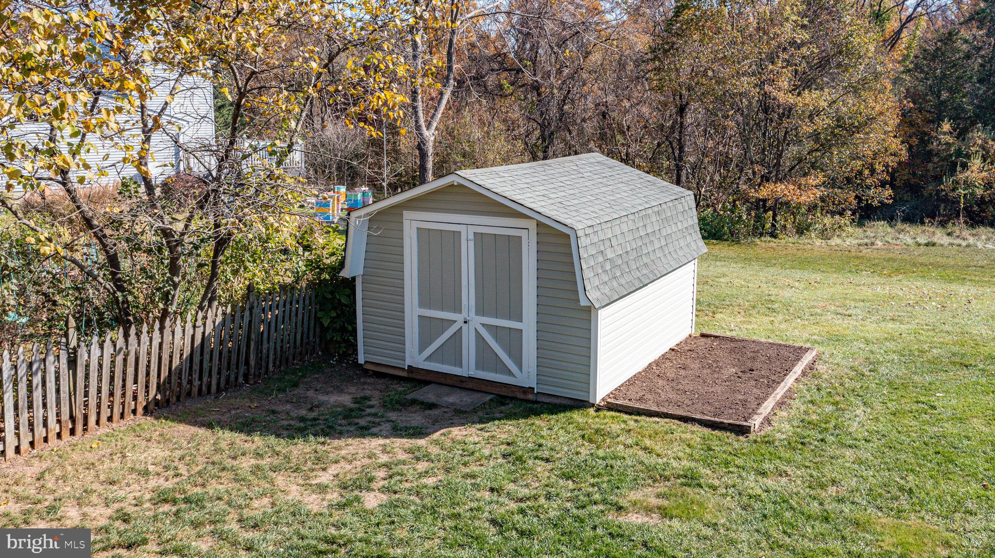 4417 Cub Run Road Chantilly, VA 20151 - Photo 7 of 57 a view of a house with a yard and large tree
