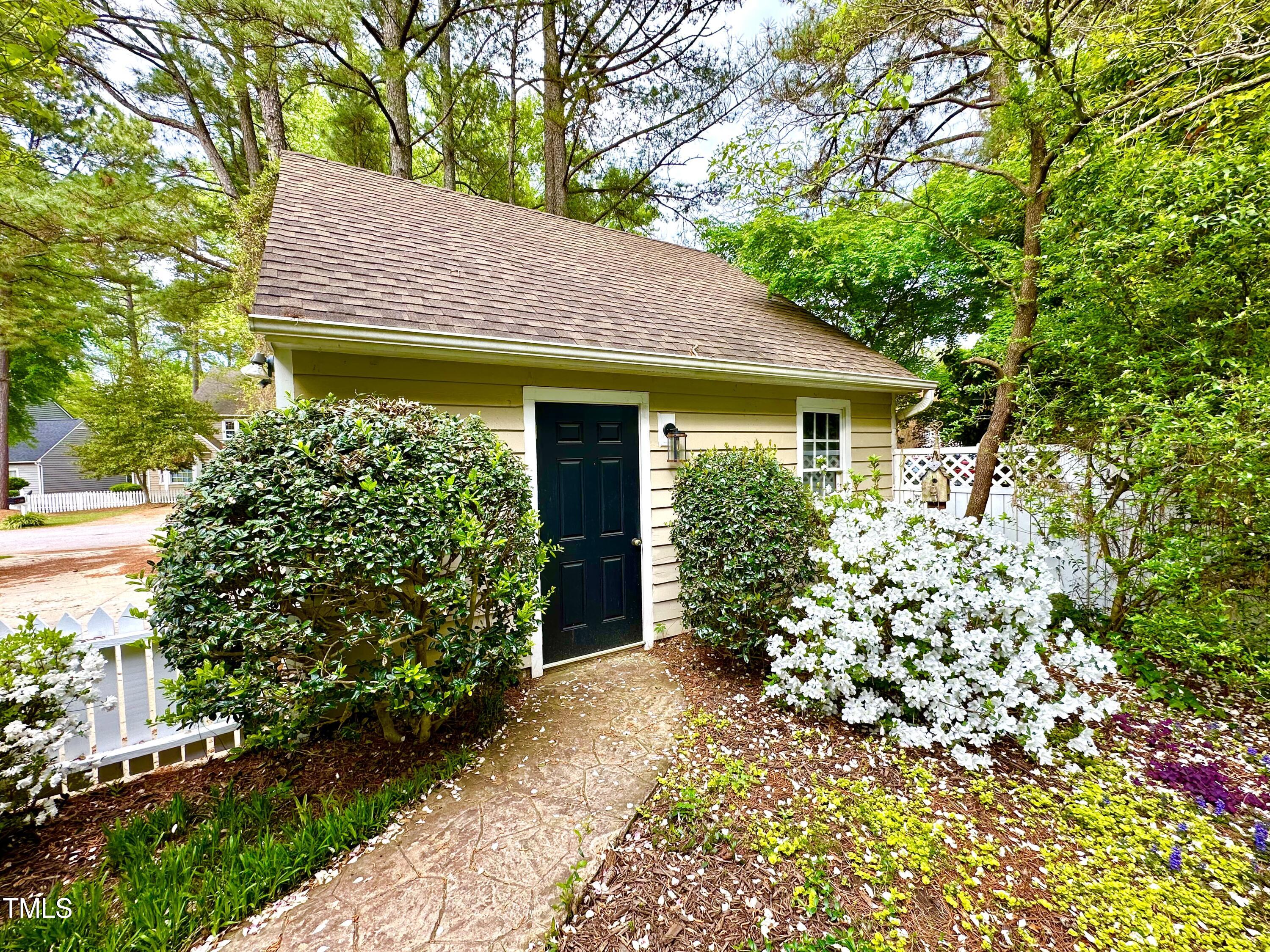 1712 Briarforest Place Raleigh, NC 27615 - Photo 42 of 55 The detached garage is only a few steps from the front porch.