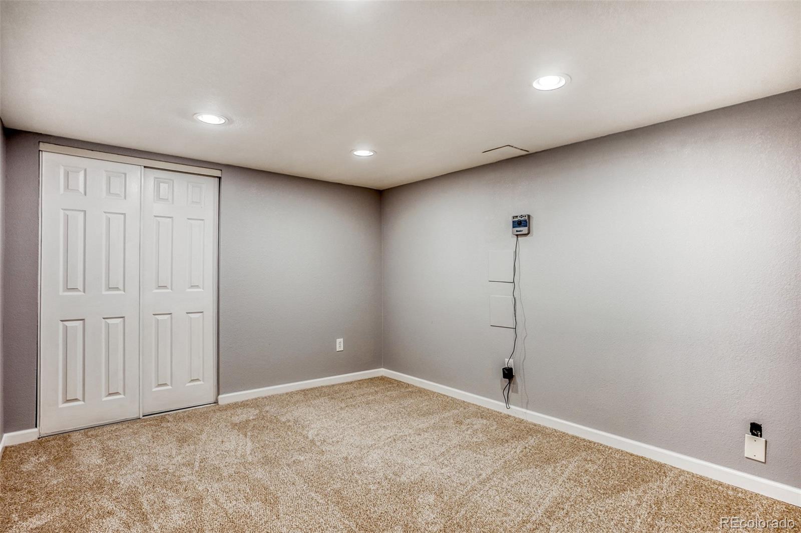 2356 Florence Street Aurora, CO 80010 - Photo 22 of 31 a view of a room with an empty space