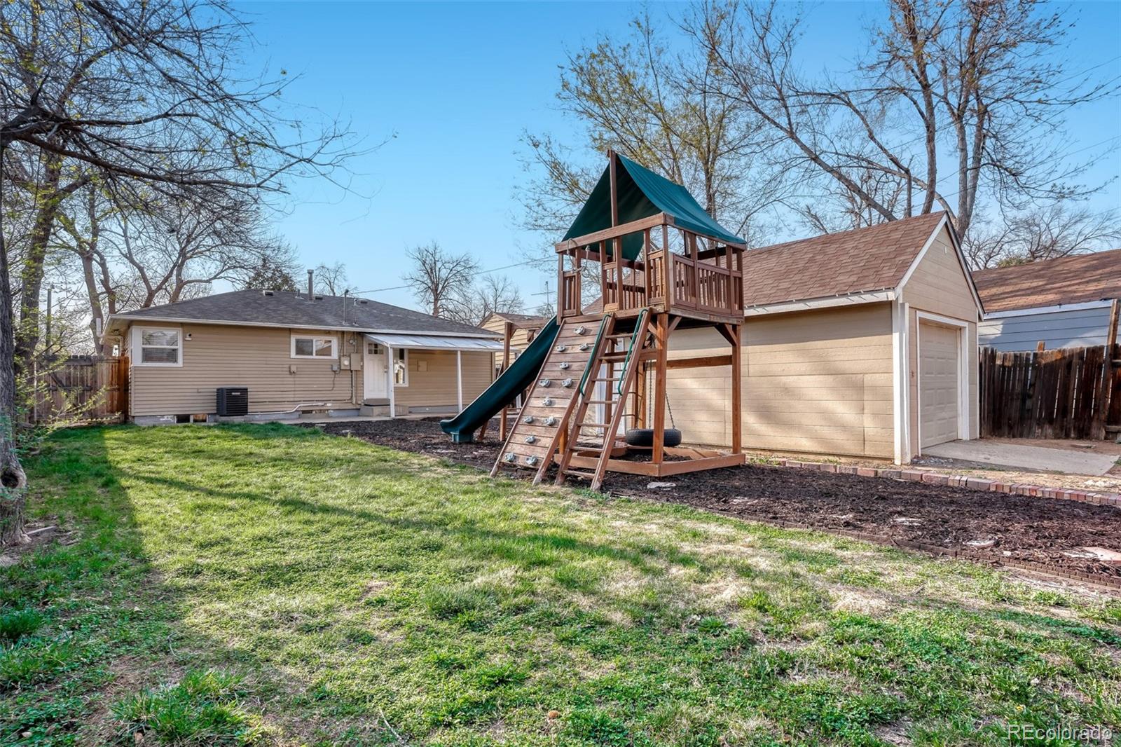 2356 Florence Street Aurora, CO 80010 - Photo 27 of 31 a view of a house with a yard