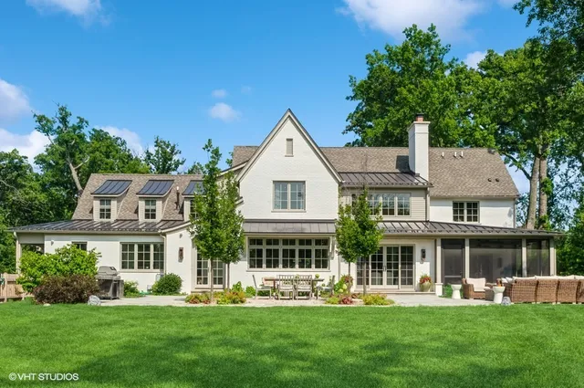 a front view of a building with a garden