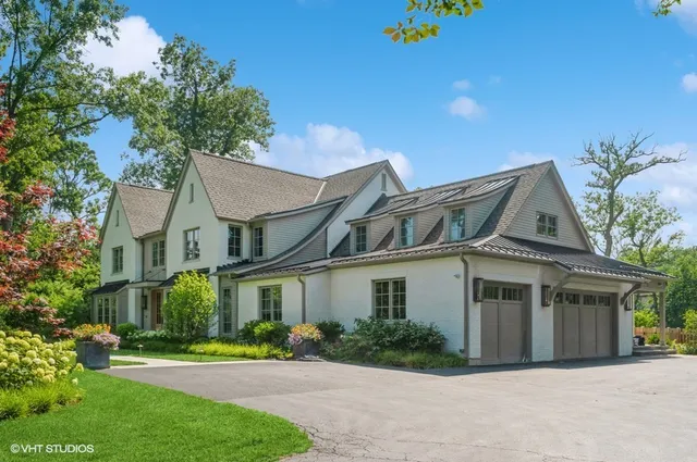 front view of a house with a garden