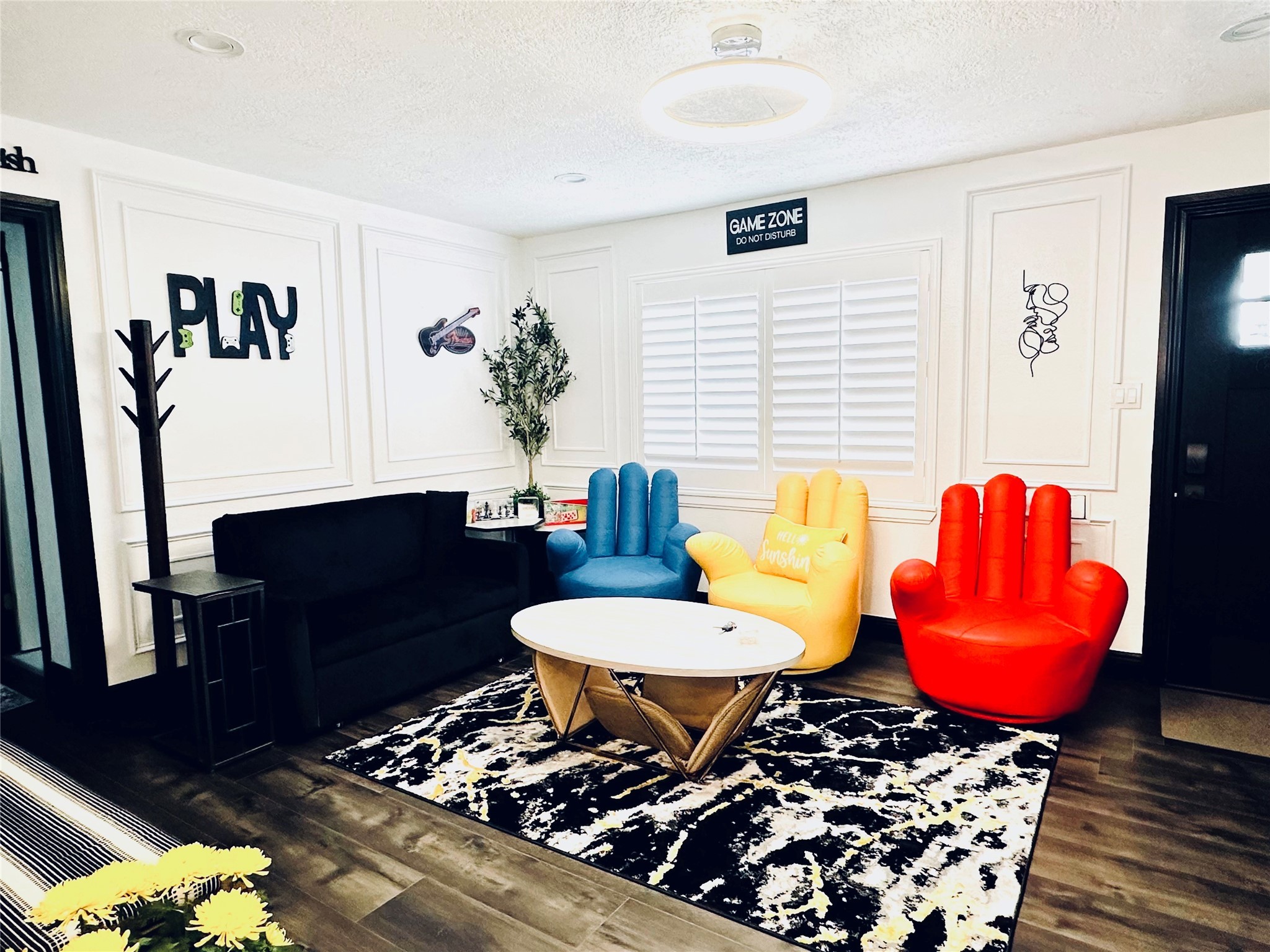 1426 Harbor View Drive Galveston, TX 77550 - Photo 13 of 16 a living room with furniture and a potted plant