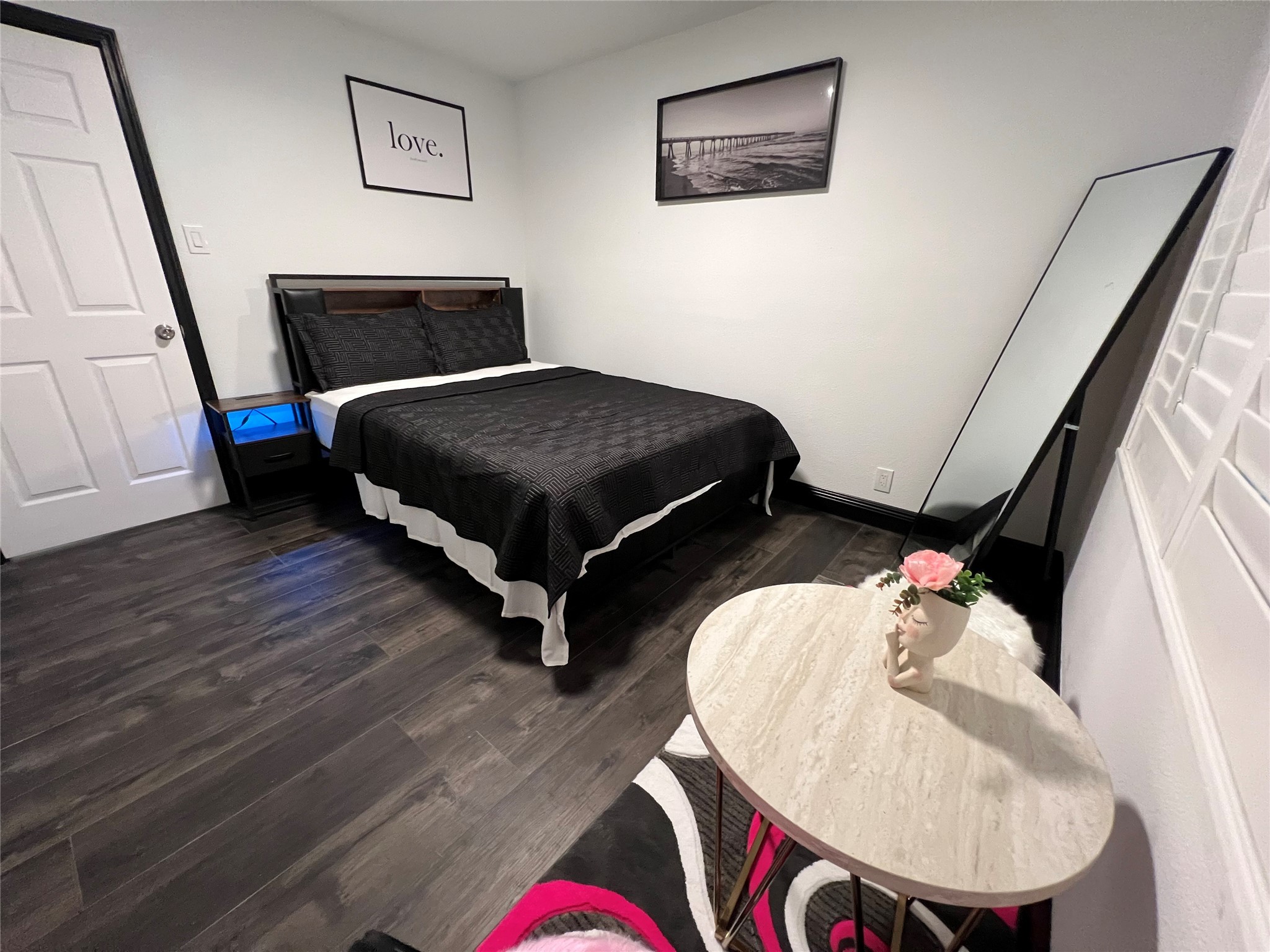 1426 Harbor View Drive Galveston, TX 77550 - Photo 16 of 16 a bedroom with furniture and a mirror