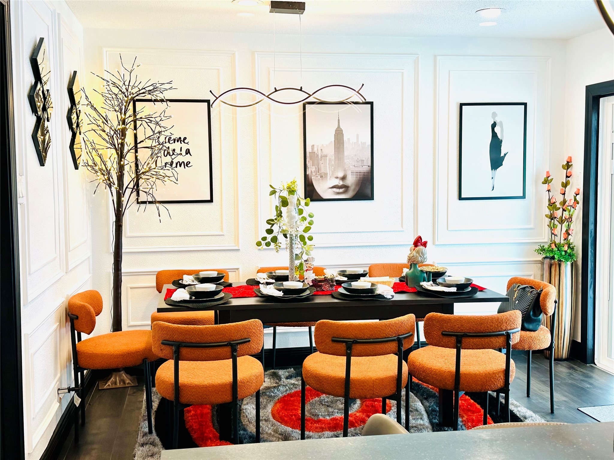 1426 Harbor View Drive Galveston, TX 77550 - Photo 6 of 16 a view of a dining room with furniture and wooden floor