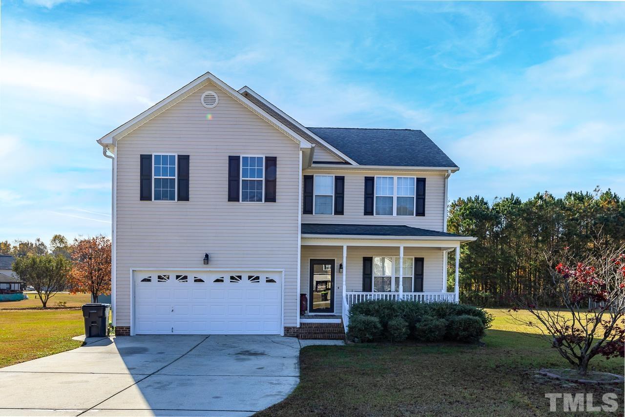 229 Roping Horn Way Willow Spring, NC 27592 - Photo 1 of 30 a front view of a house with a yard