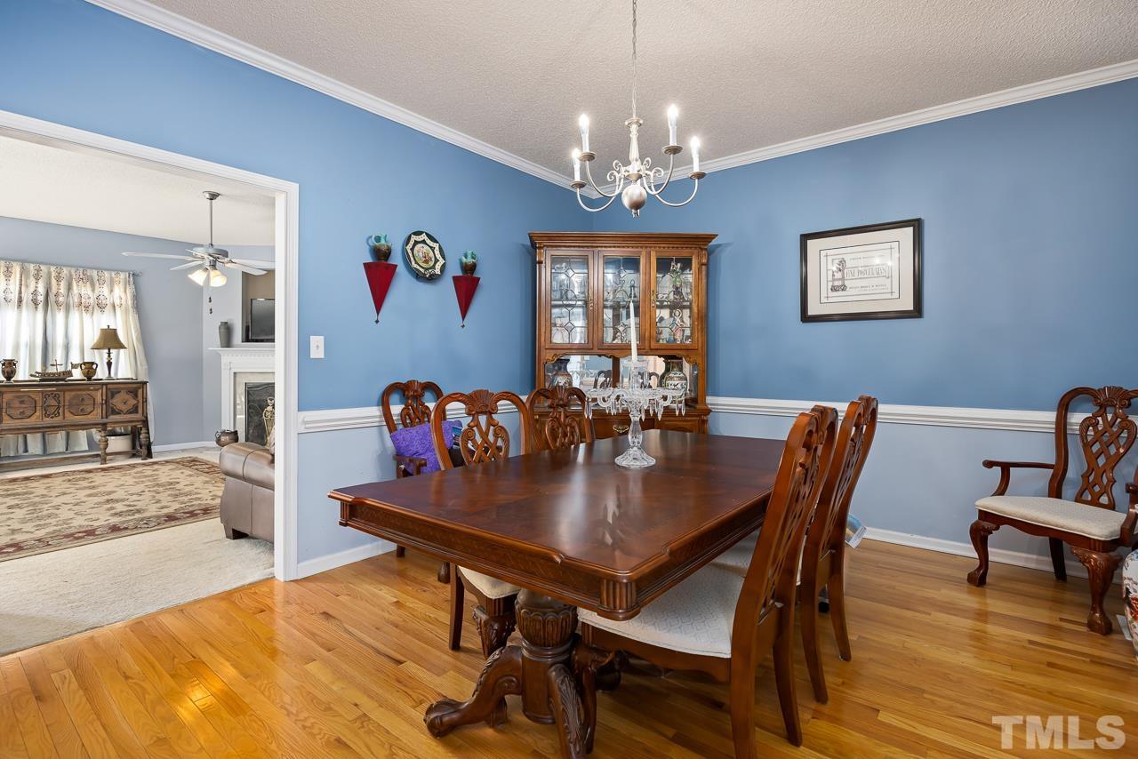 229 Roping Horn Way Willow Spring, NC 27592 - Photo 10 of 30 a view of a dining room with furniture