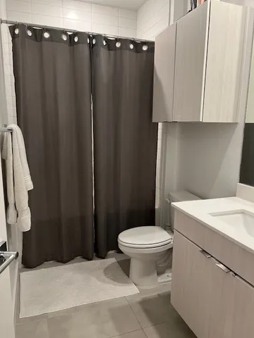 a bathroom with a sink and a toilet