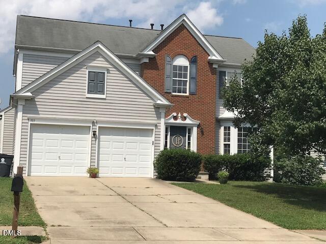 103 Rock River Road Morrisville, NC 27560 - Photo 2 of 18 a front view of a house with a yard