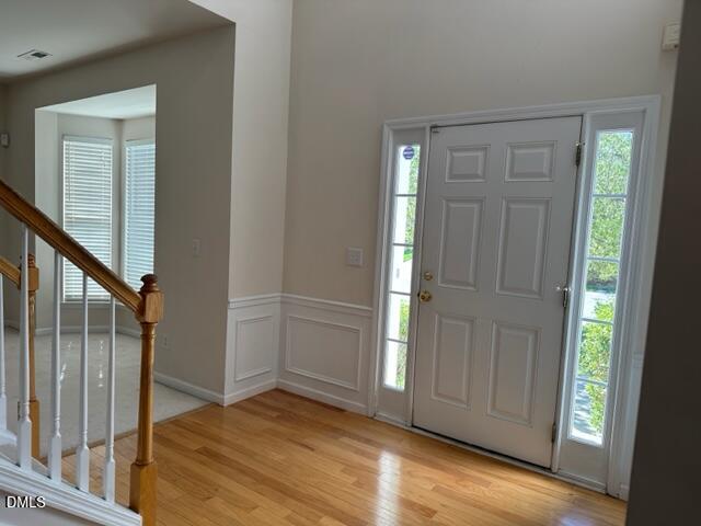 103 Rock River Road Morrisville, NC 27560 - Photo 3 of 18 a view of front door with hallway