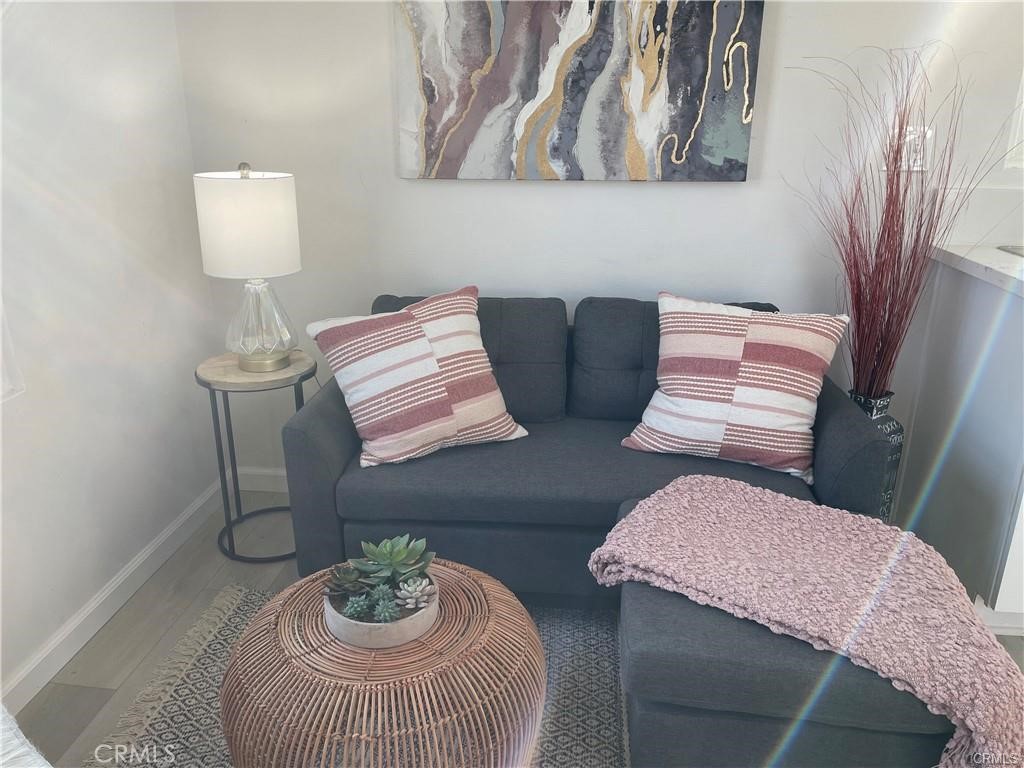 10098 Campbell Avenue, Unit 4 Riverside, CA 92503 - Photo 12 of 17 a bedroom with furniture and a window