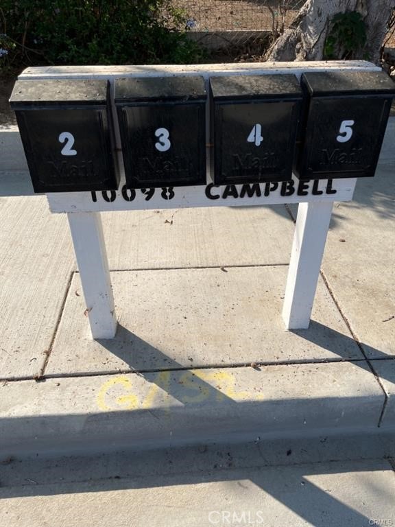 10098 Campbell Avenue, Unit 4 Riverside, CA 92503 - Photo 15 of 17 a bathroom with a sink and mirror
