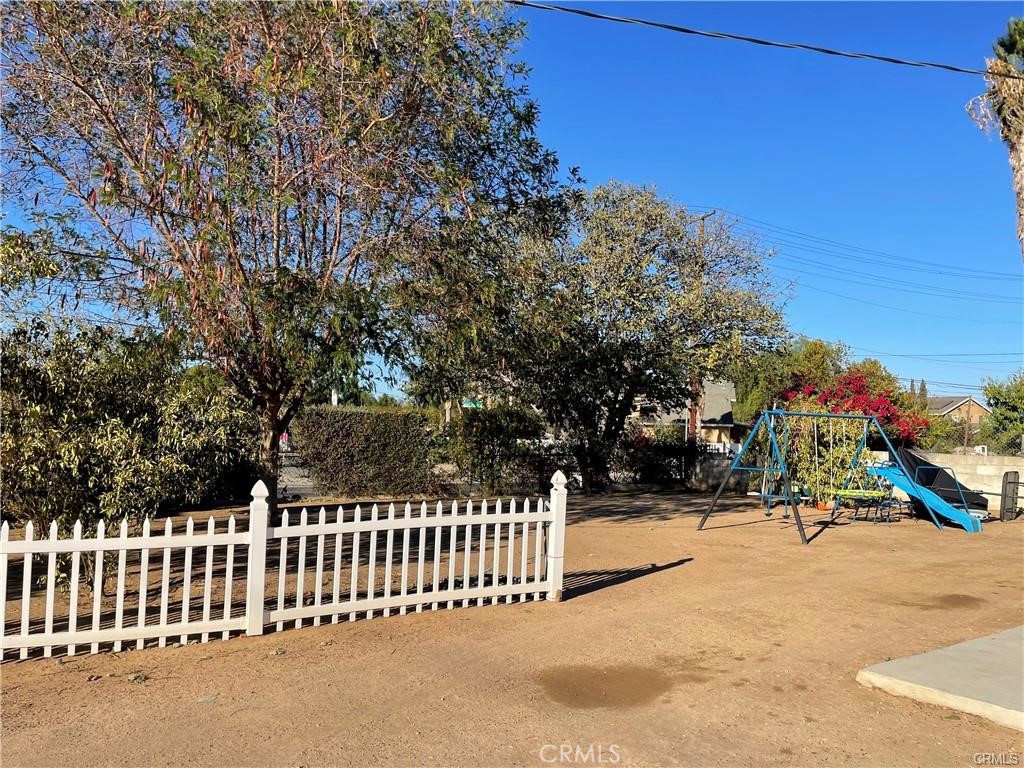 10098 Campbell Avenue, Unit 4 Riverside, CA 92503 - Photo 16 of 17 a view of a park with iron fence
