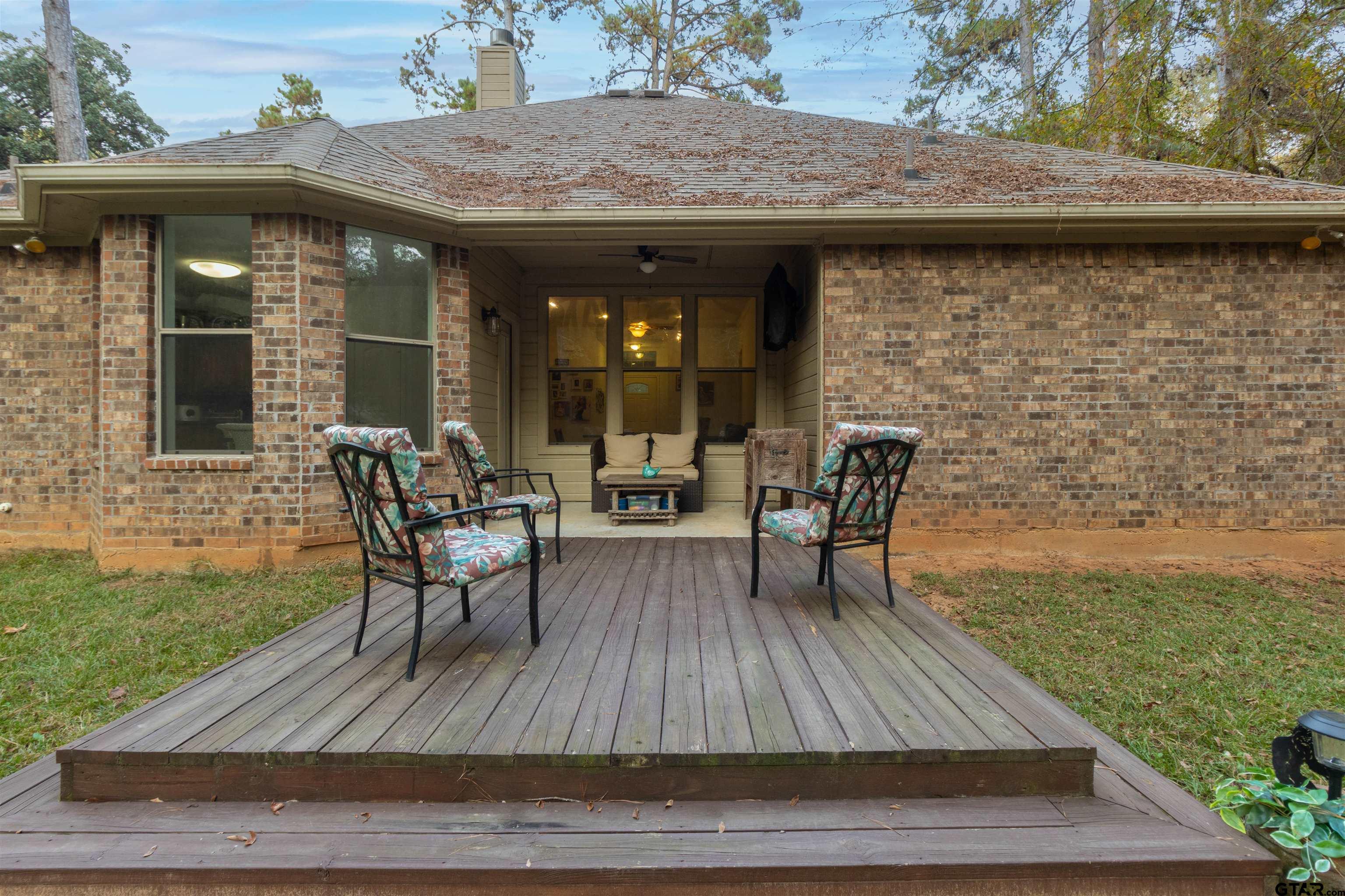 18424 Walnut Circle Flint, TX 75762 - Photo 21 of 26 a view of outdoor sitting area with furniture
