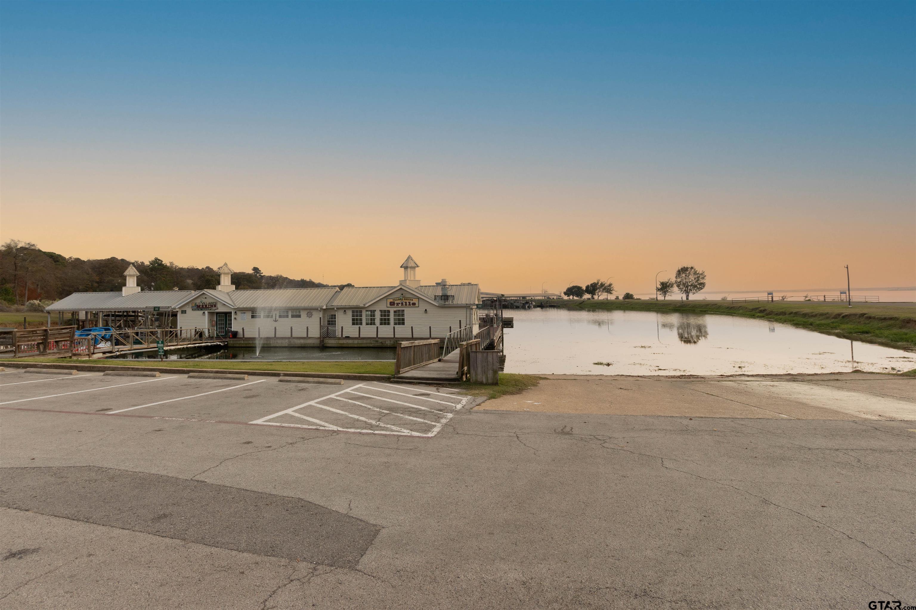 18424 Walnut Circle Flint, TX 75762 - Photo 24 of 26 a view of a swimming pool and an ocean view