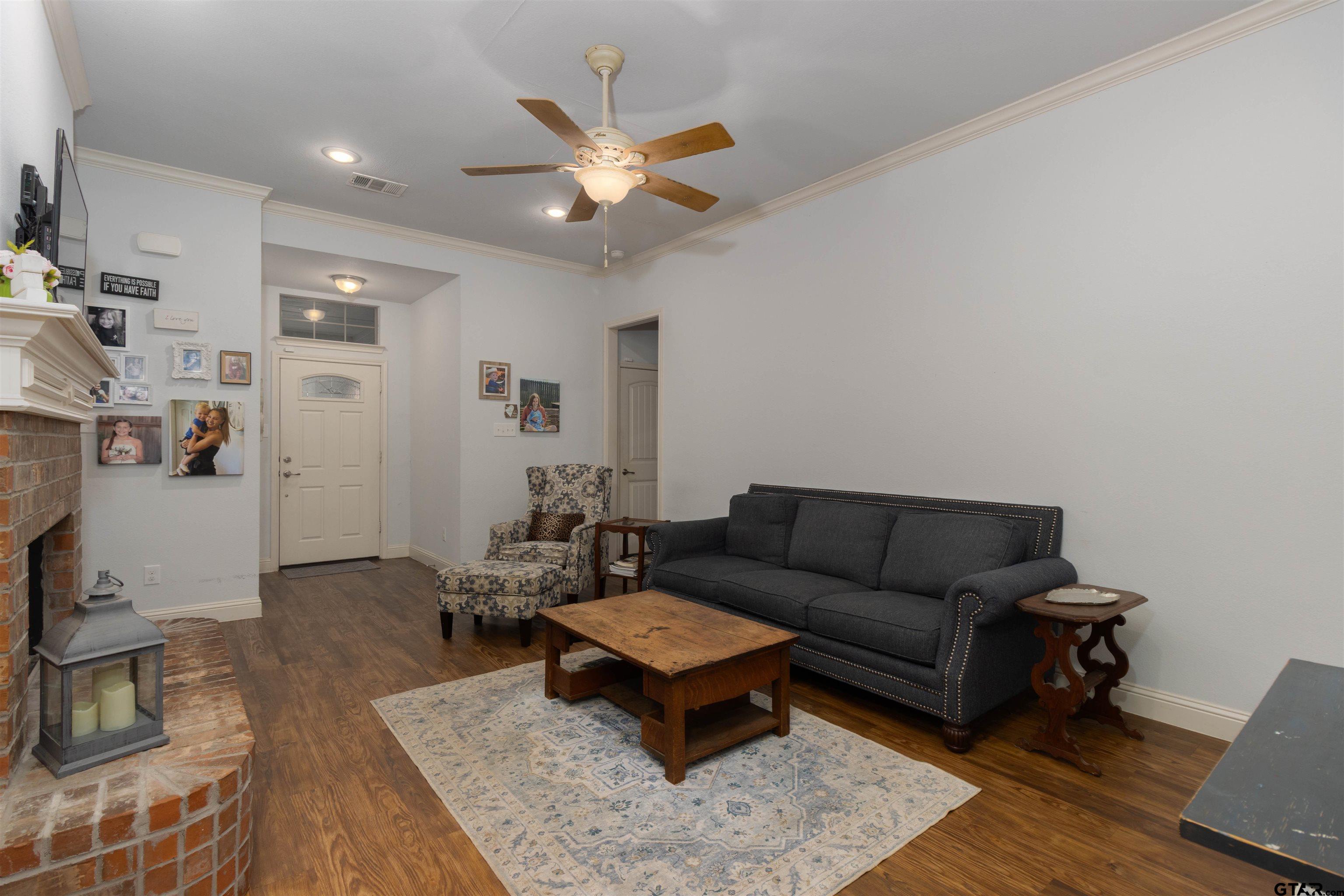 18424 Walnut Circle Flint, TX 75762 - Photo 5 of 26 a living room with furniture and a wooden floor