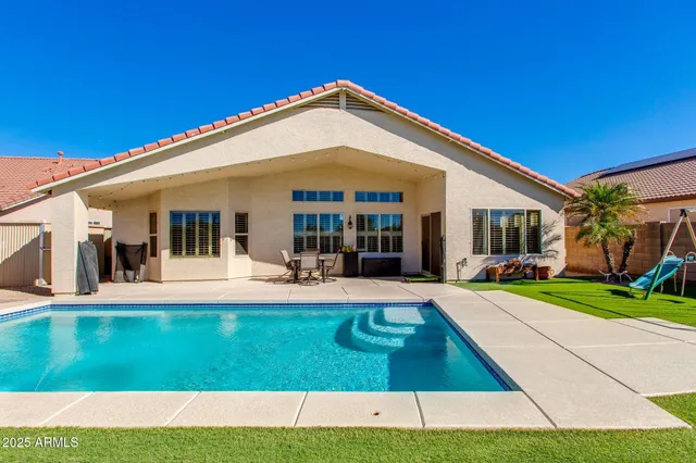 a view of washer and dryer with wooden floor