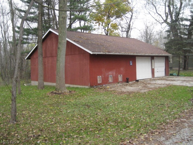 15059 Tavern Road Burton, OH 44021 - Photo 5 of 21 The outbuilding is 40 X 22. There are two overhead doors and lots of additional storage