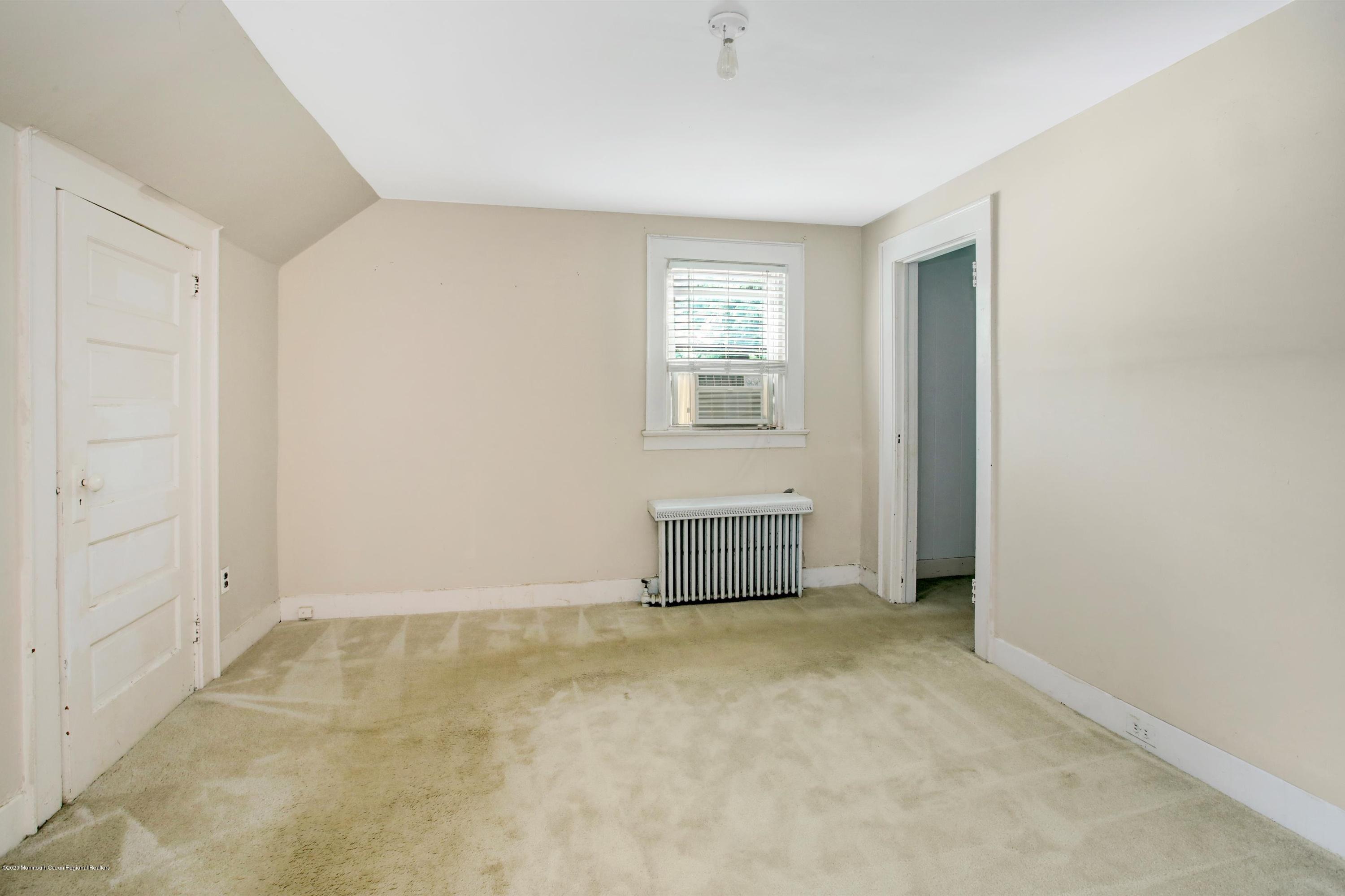 474 E Road Belford, NJ 07718 - Photo 11 of 32 a view of an empty room with a window