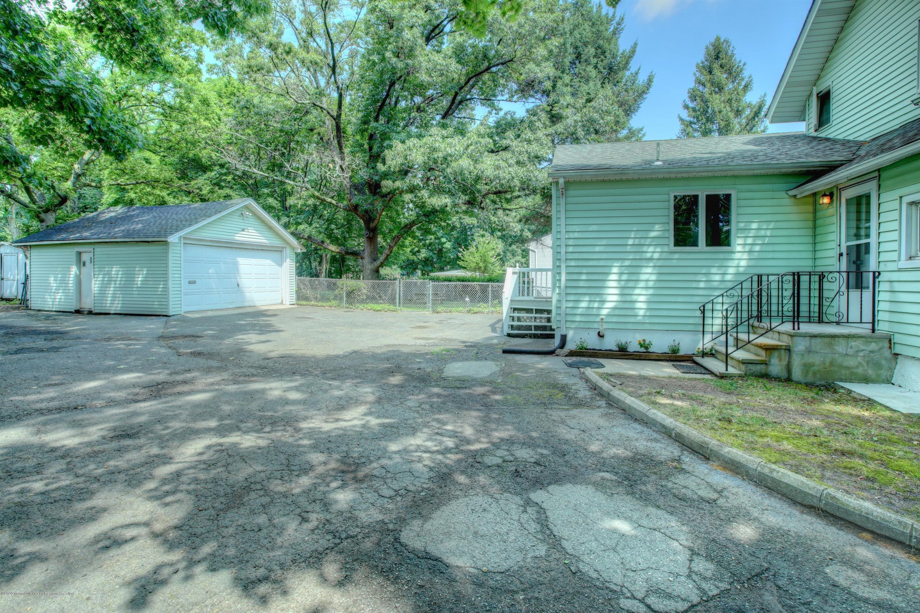 474 E Road Belford, NJ 07718 - Photo 21 of 32 a view of a house with a yard