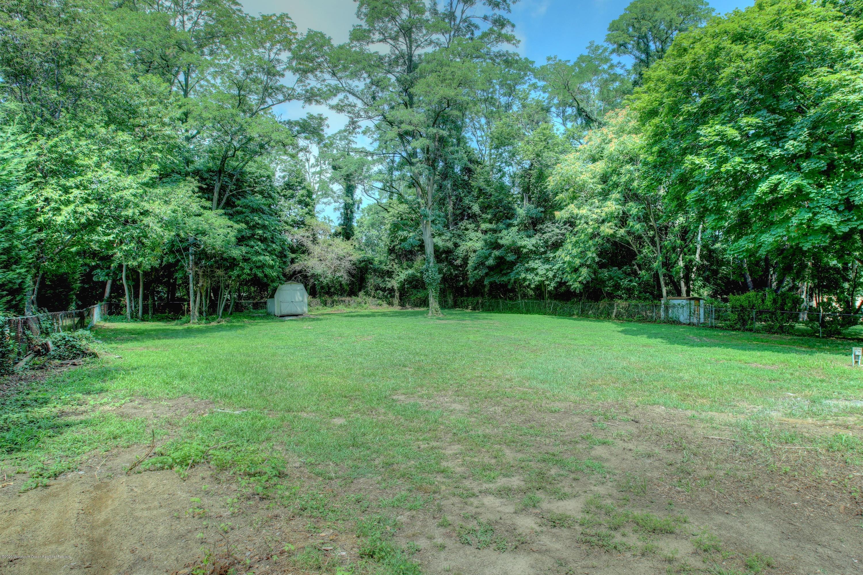 474 E Road Belford, NJ 07718 - Photo 23 of 32 a view of a garden with a tree