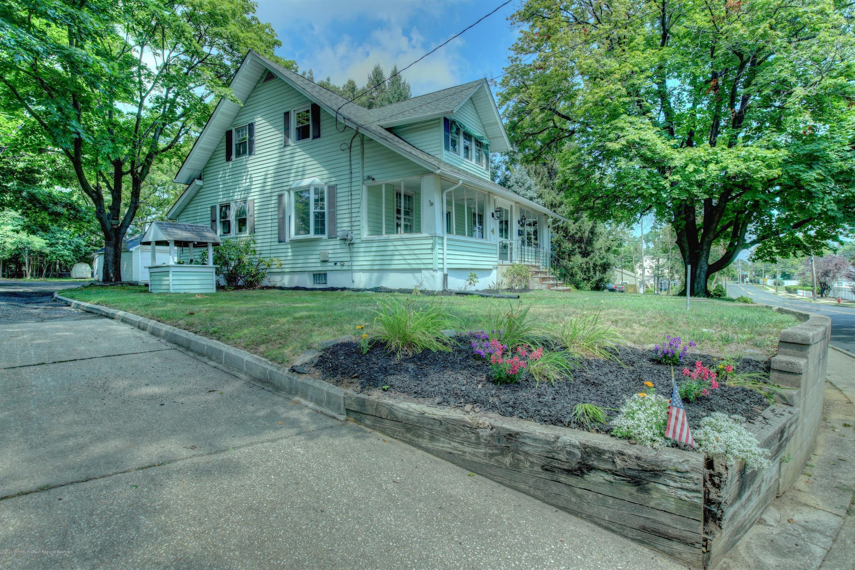 474 E Road Belford, NJ 07718 - Photo 25 of 32 a view of a house with a garden