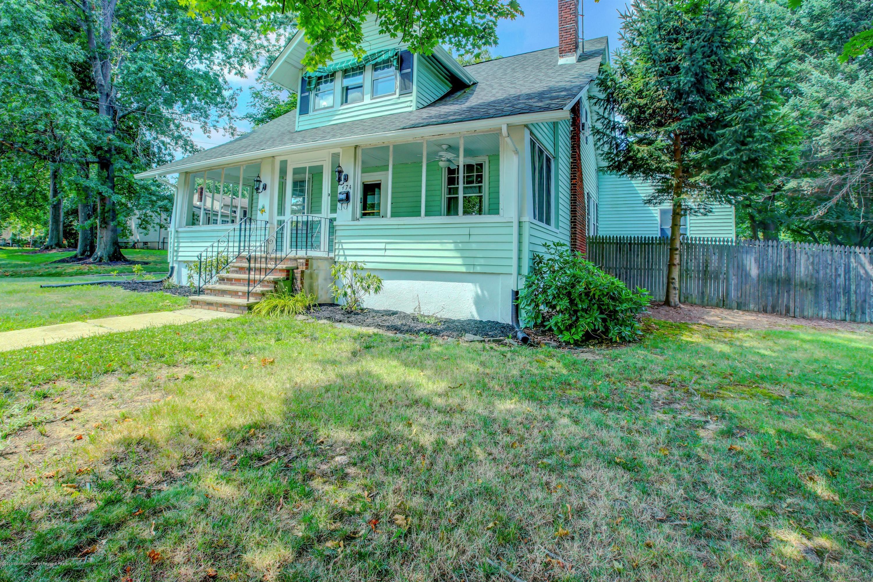 474 E Road Belford, NJ 07718 - Photo 26 of 32 a view of a house with a yard and sitting area