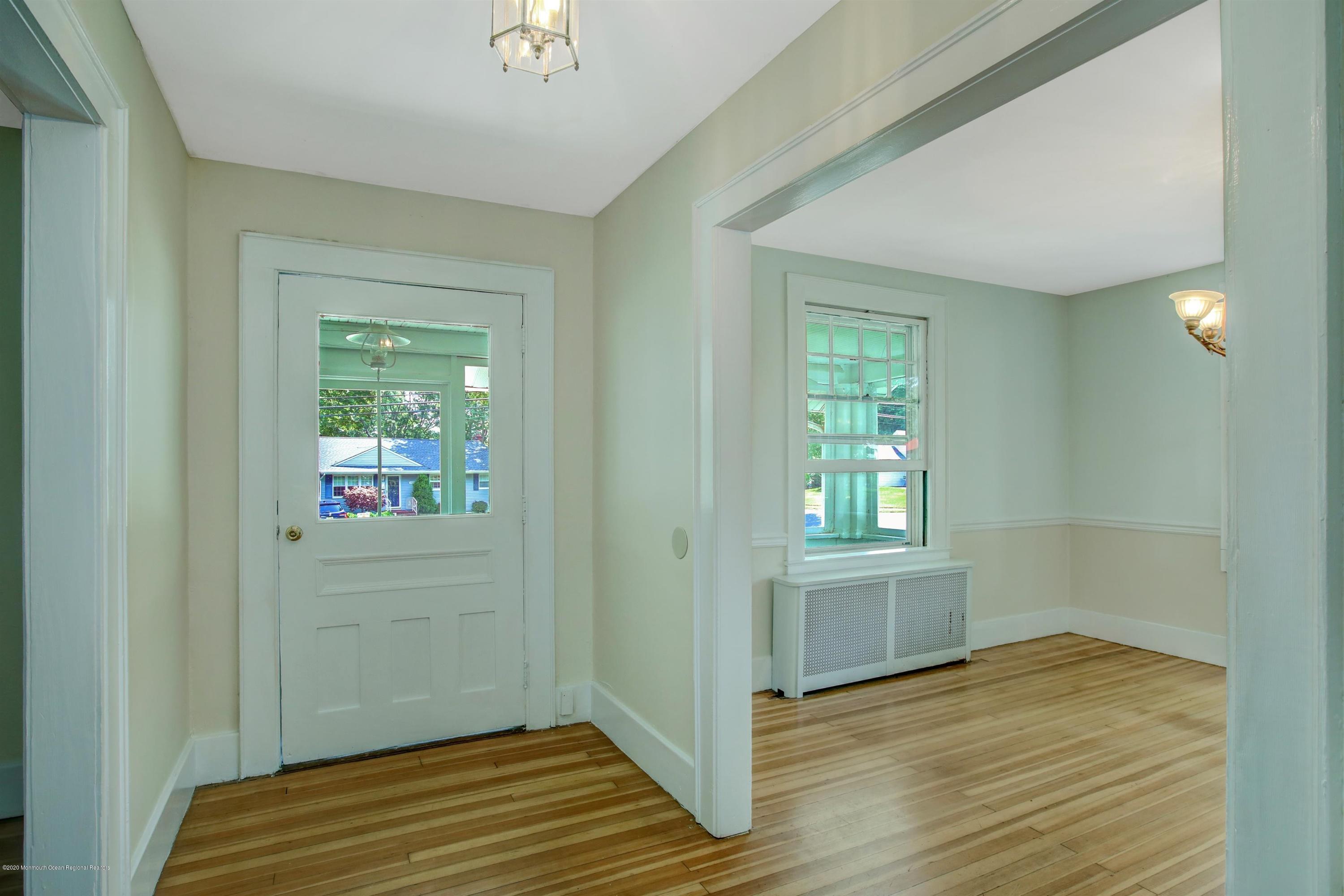 474 E Road Belford, NJ 07718 - Photo 3 of 32 an empty room with windows