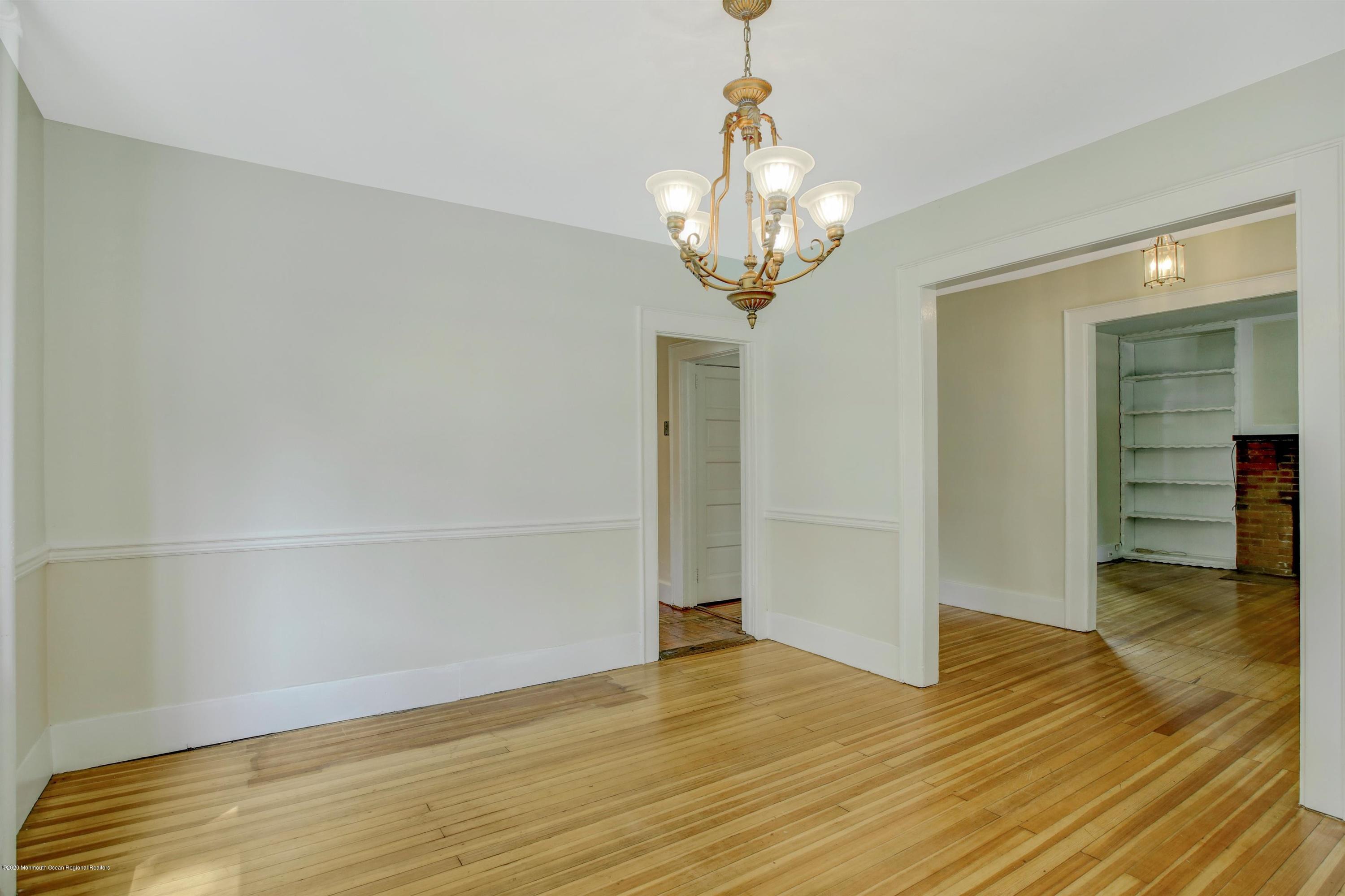 474 E Road Belford, NJ 07718 - Photo 7 of 32 a view of empty room with wooden floor