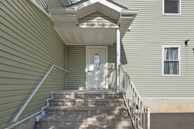 a view of a entrance with stairs