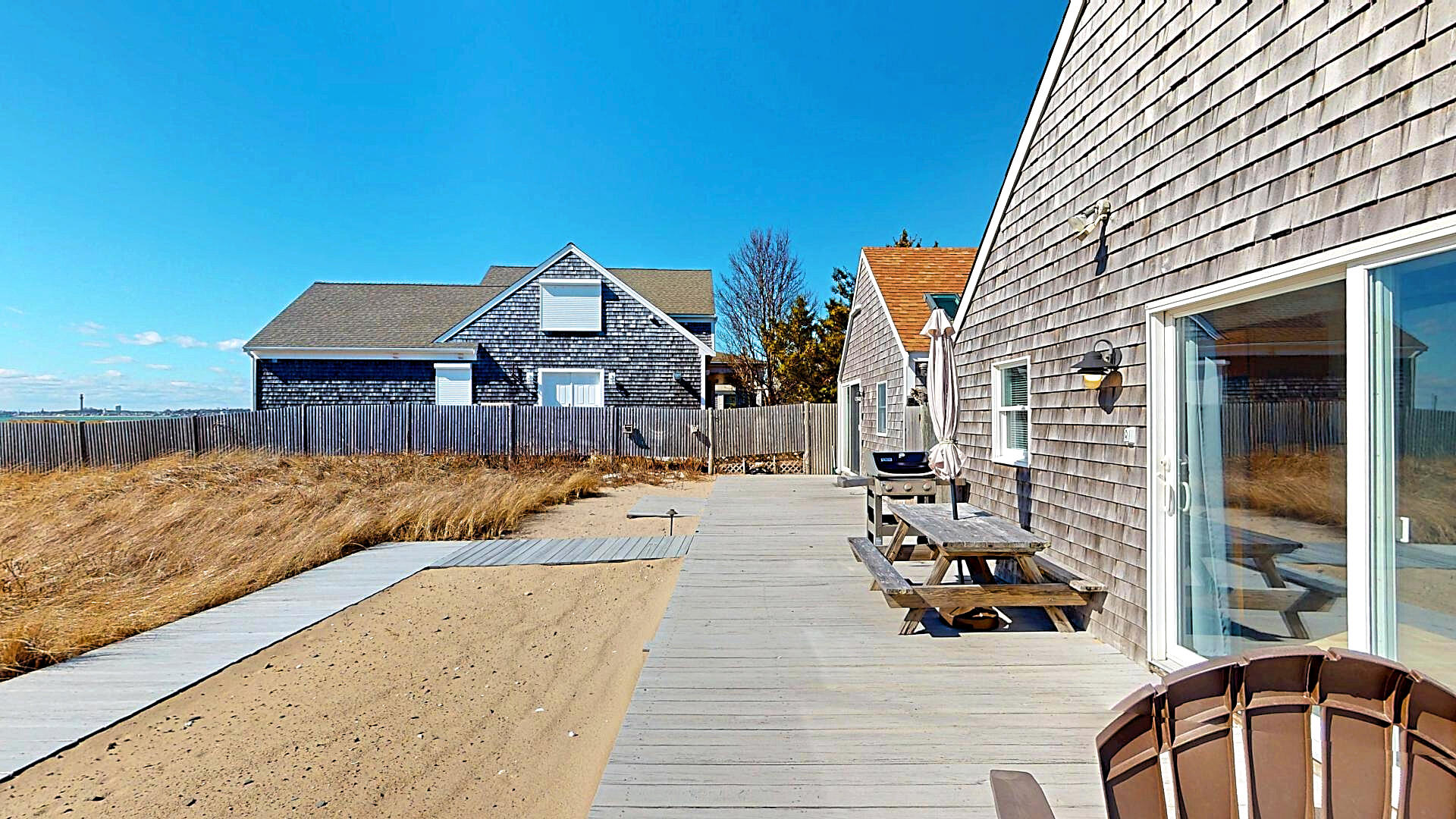 596 Shore Road, Unit G Truro, MA 02666 - Photo 23 of 27 a view of a house with swimming pool and sitting area