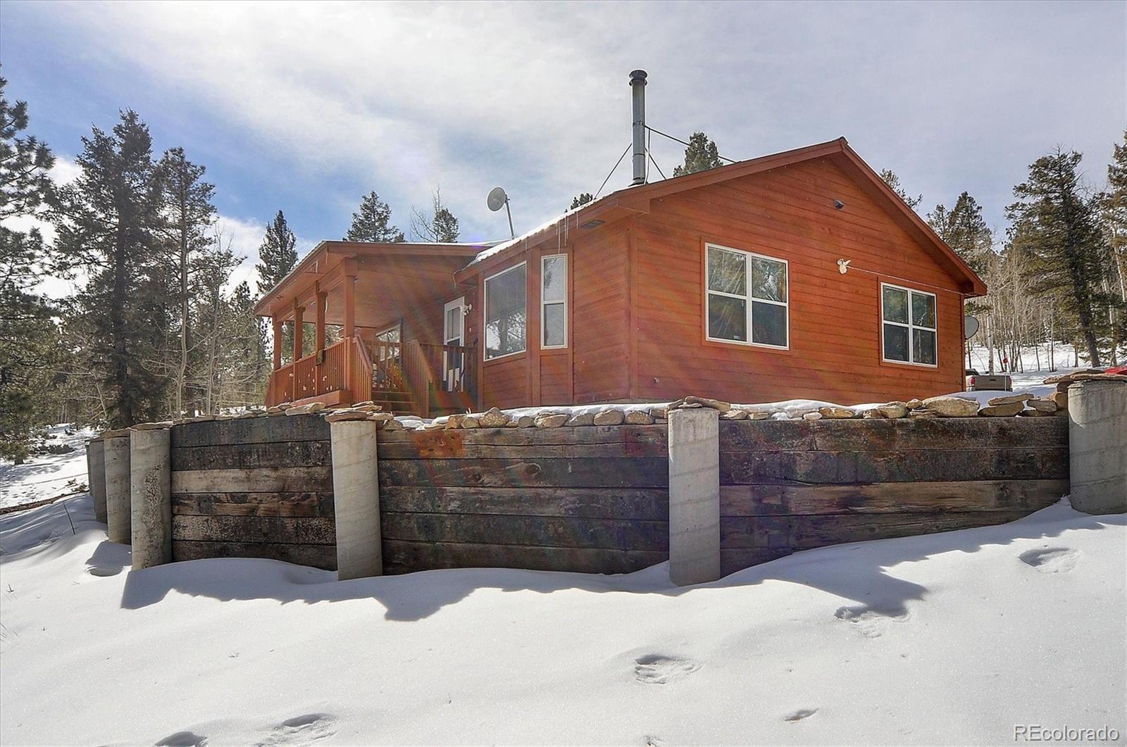 1733 Blacksmith Road Hartsel, CO 80449 - Photo 1 of 22 a front view of a house