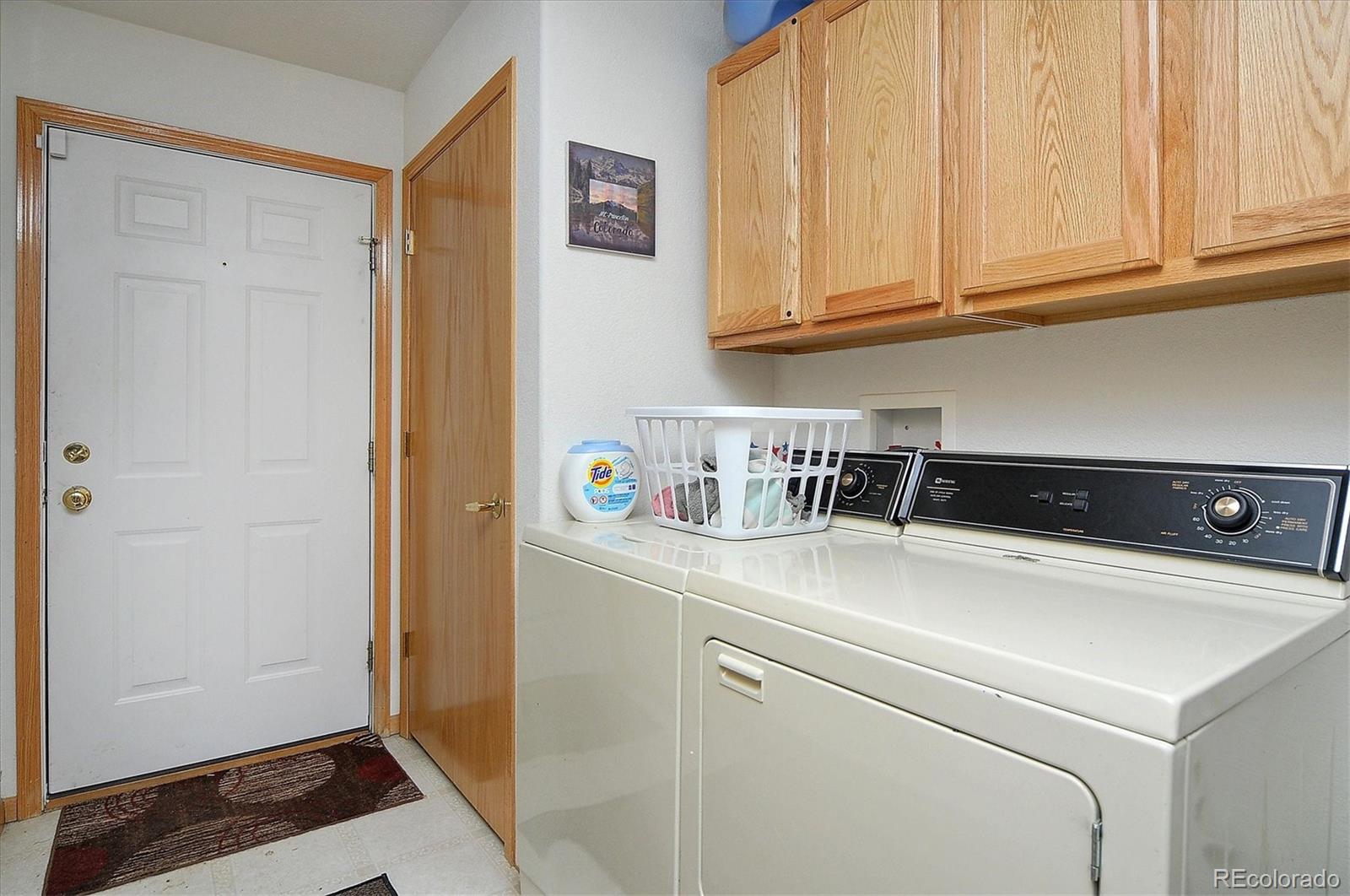 1733 Blacksmith Road Hartsel, CO 80449 - Photo 19 of 22 a utility room with dryer and washer