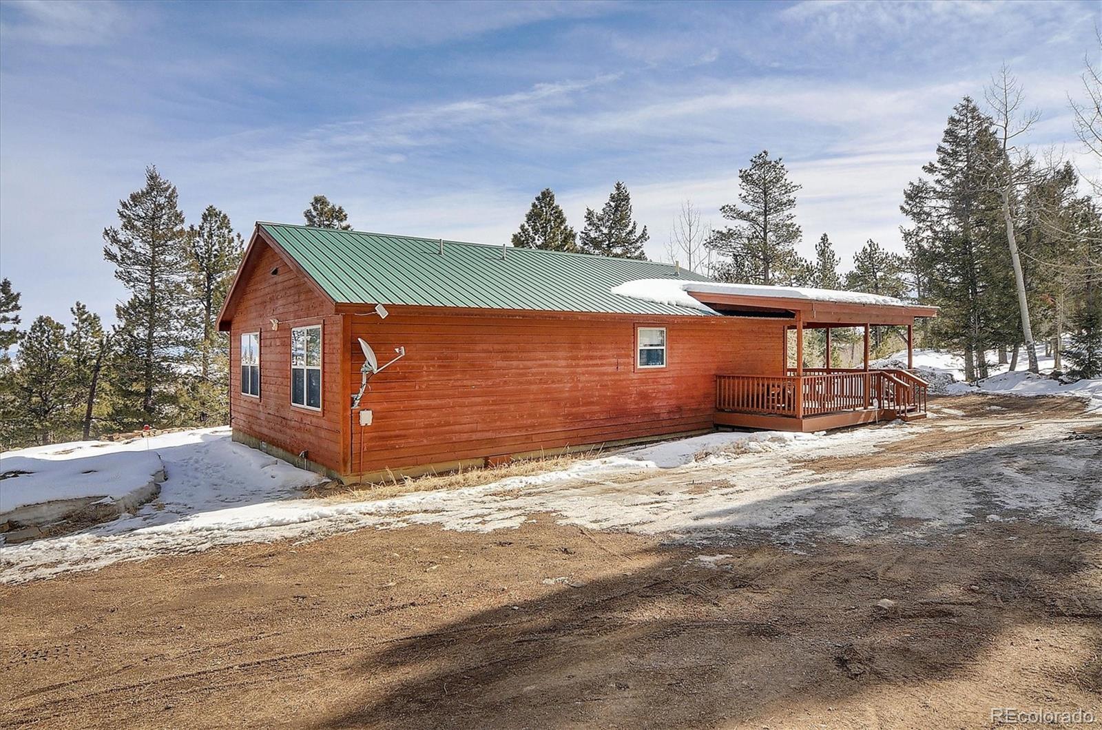 1733 Blacksmith Road Hartsel, CO 80449 - Photo 22 of 22 a front view of a house with a yard