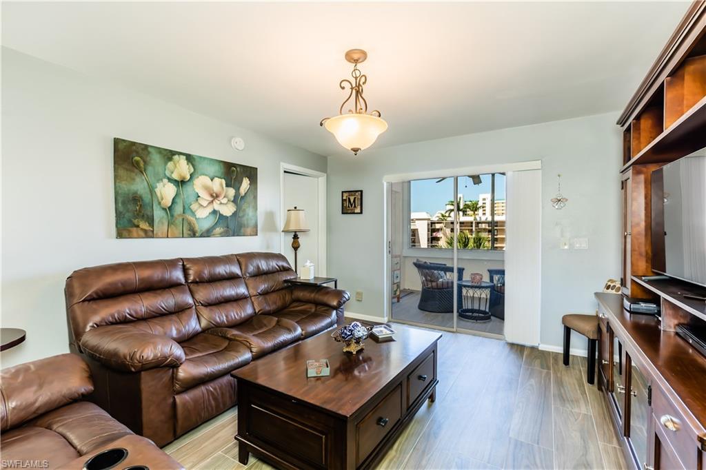 921 Seagrape Drive, Unit 308B Marco Island, FL 34145 - Photo 19 of 19 Living room featuring light hardwood / wood-style floors