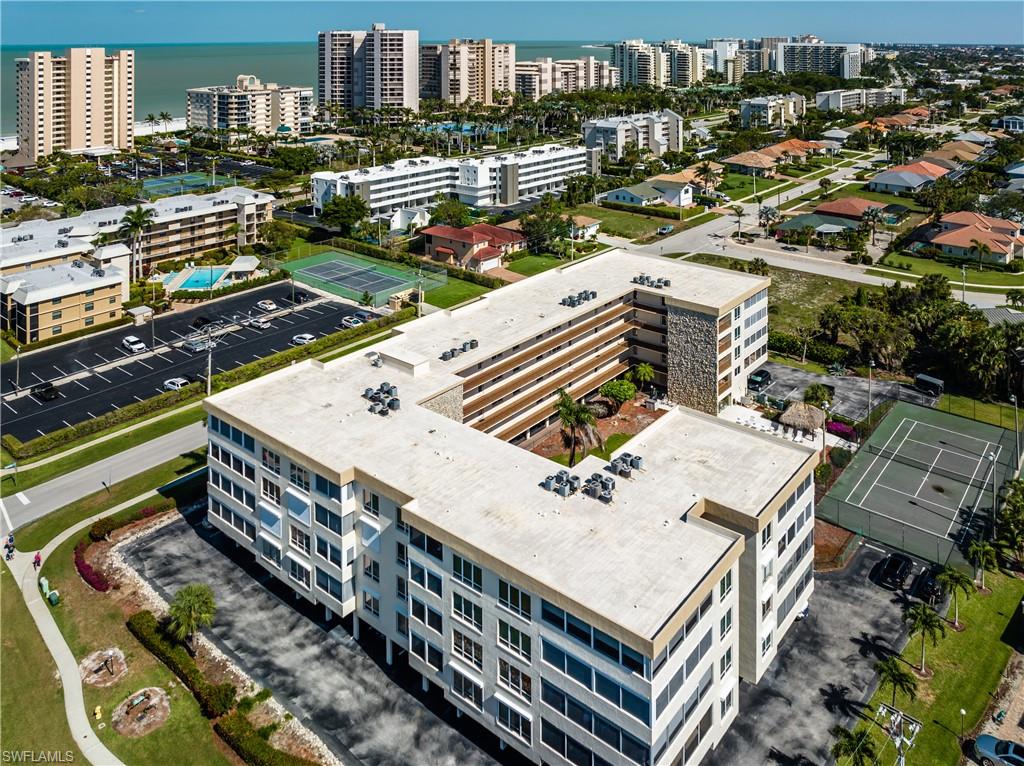 921 Seagrape Drive, Unit 308B Marco Island, FL 34145 - Photo 7 of 19 a view of a balcony with a city view