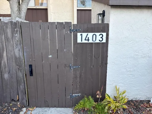 a view of outdoor space with potted plants