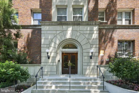 front view of a brick house with a door