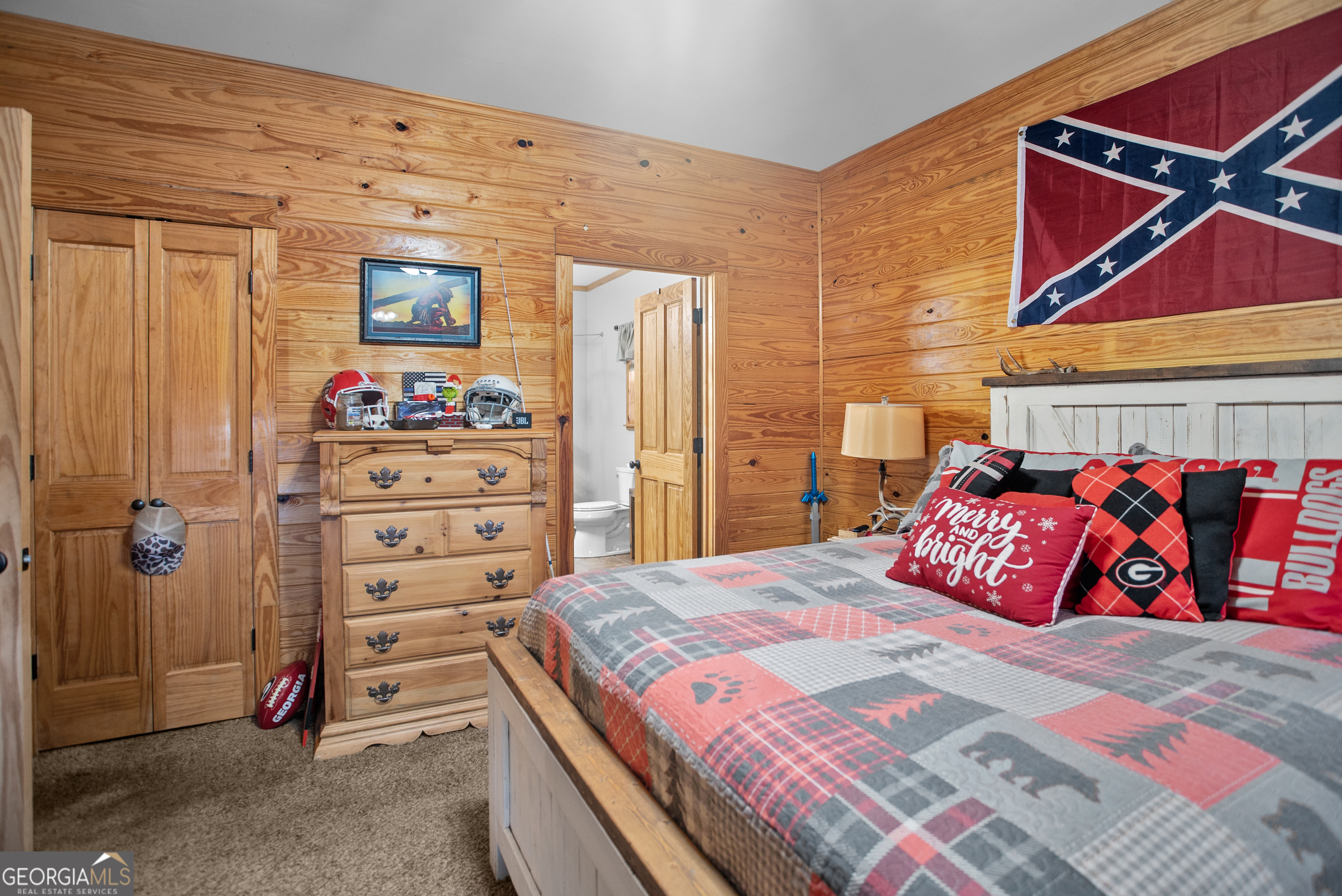 418 Oglesby Pond Road Portal, GA 30450 - Photo 15 of 56 a bedroom with a bed and a closet