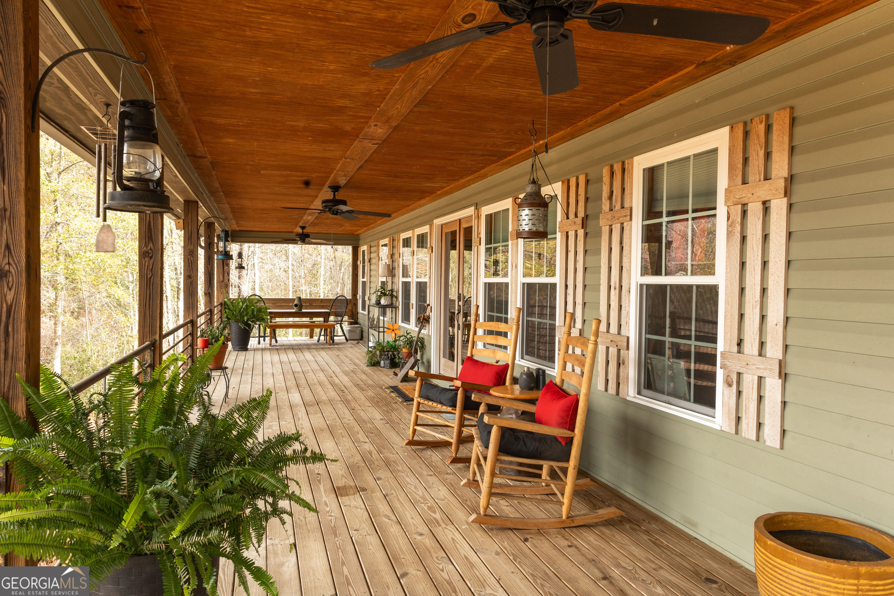 418 Oglesby Pond Road Portal, GA 30450 - Photo 2 of 56 a view of a dining room with furniture window and outside view