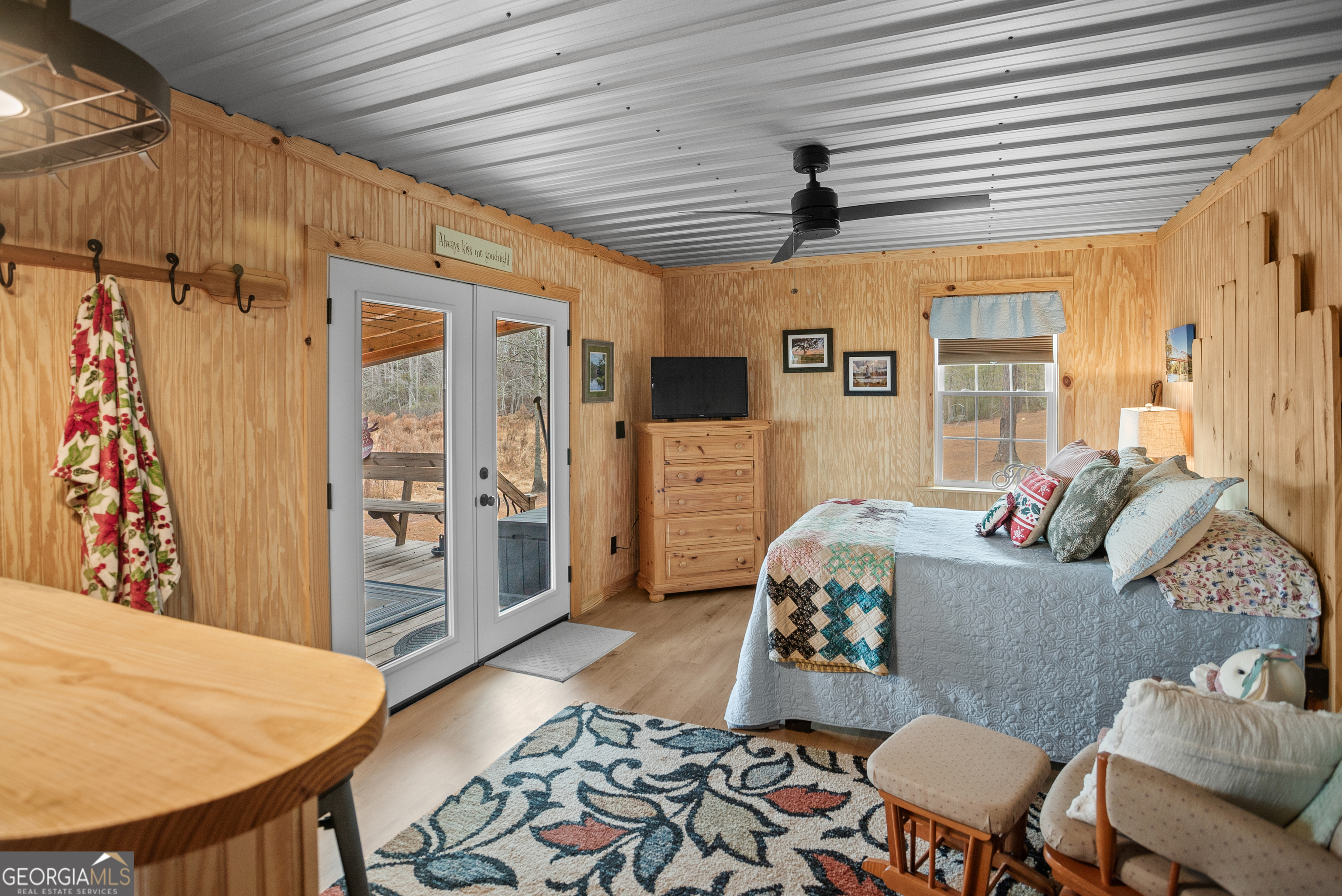 418 Oglesby Pond Road Portal, GA 30450 - Photo 41 of 56 a living room with furniture and a table