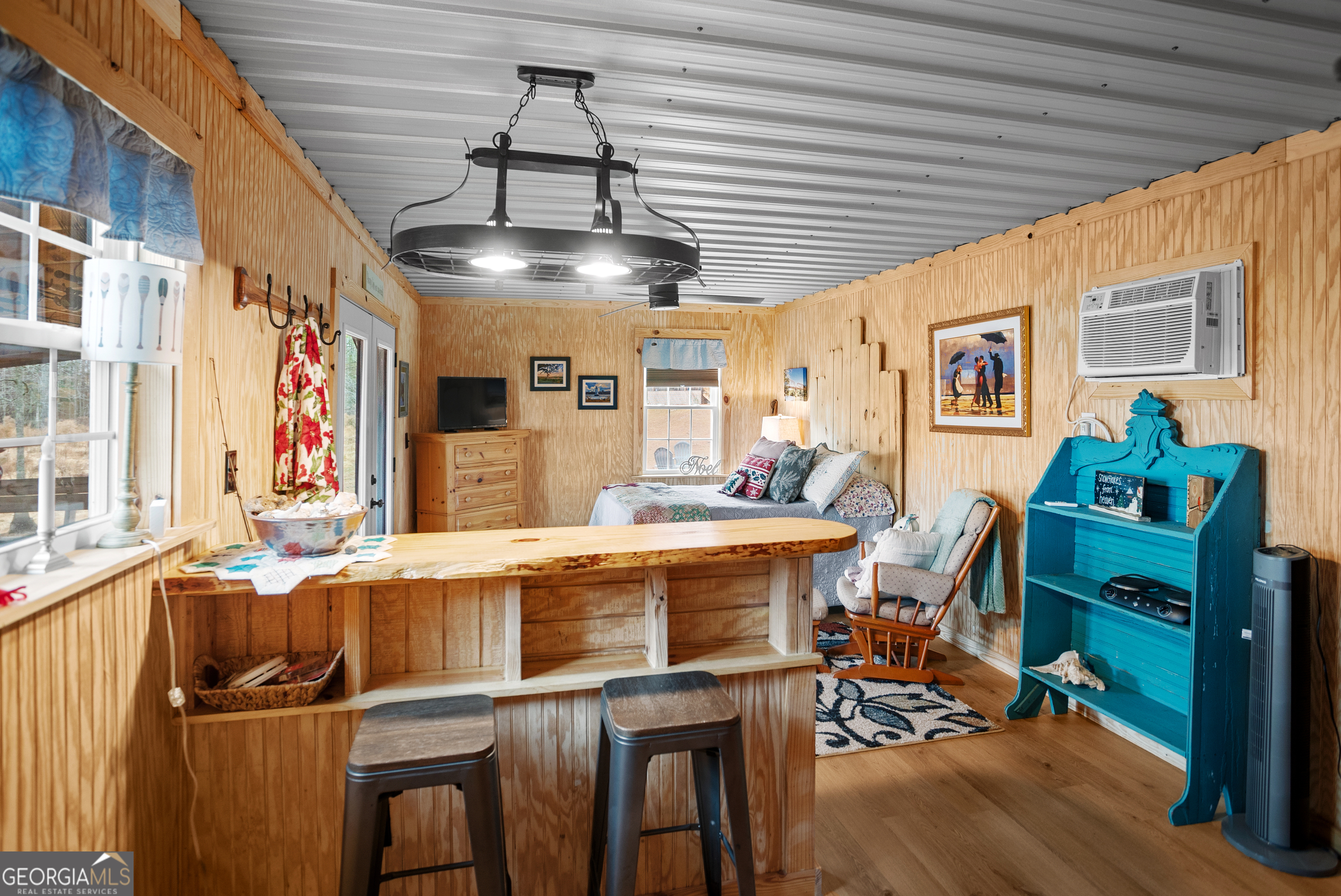 418 Oglesby Pond Road Portal, GA 30450 - Photo 45 of 56 a view of a dining room with furniture window and wooden floor