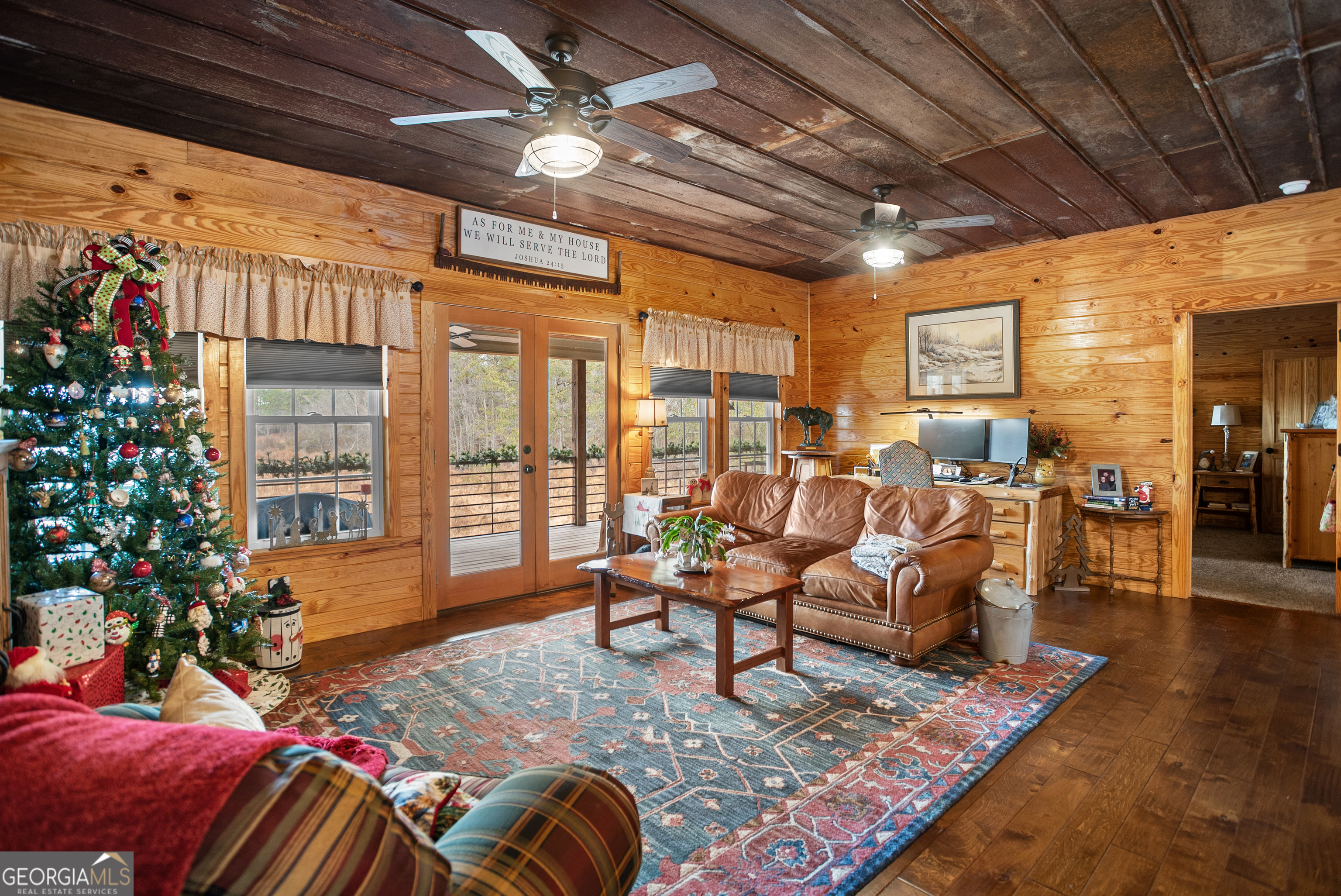 418 Oglesby Pond Road Portal, GA 30450 - Photo 6 of 56 a living room with furniture or couch and a potted plant