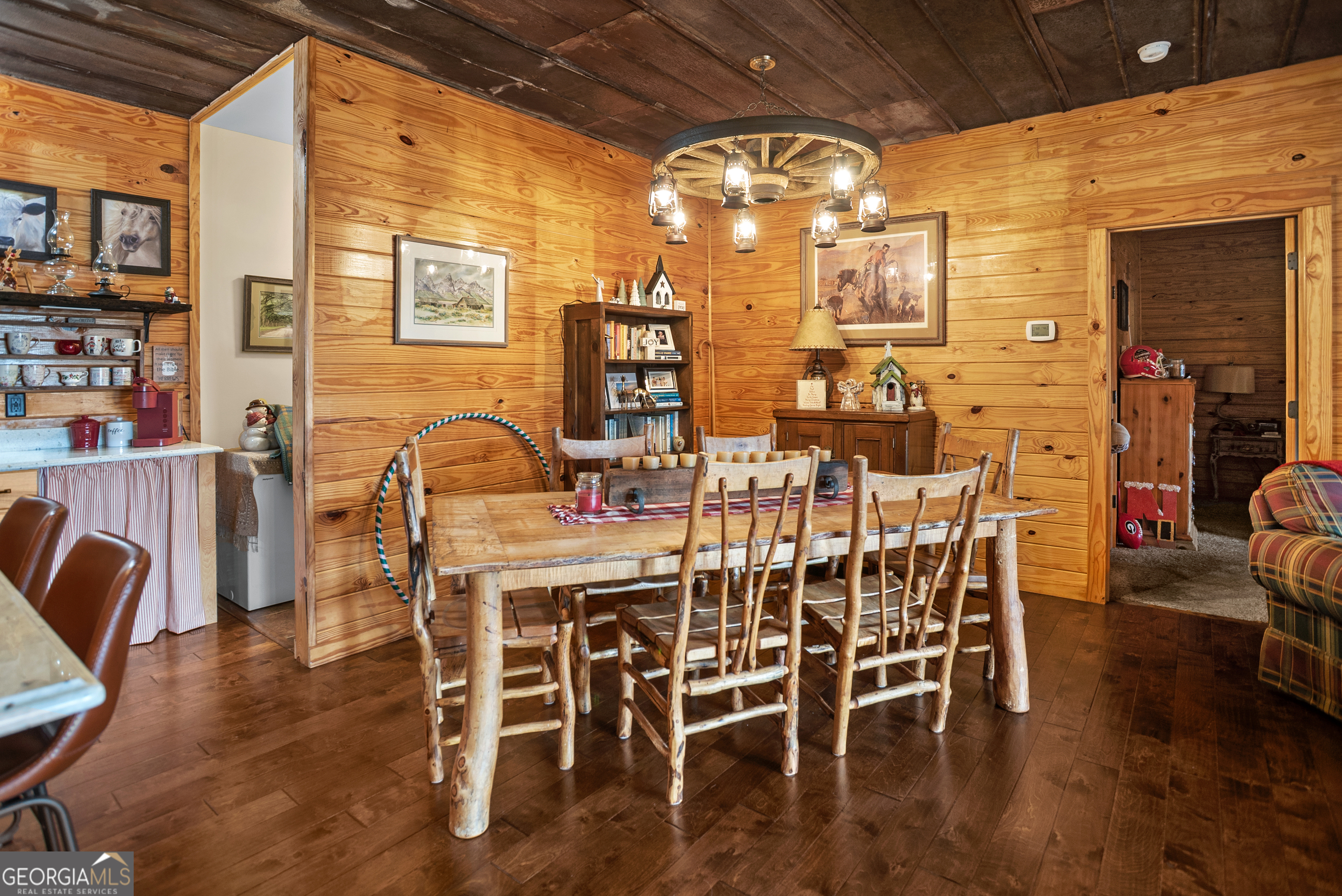 418 Oglesby Pond Road Portal, GA 30450 - Photo 9 of 56 a view of a dining room with furniture and chandelier