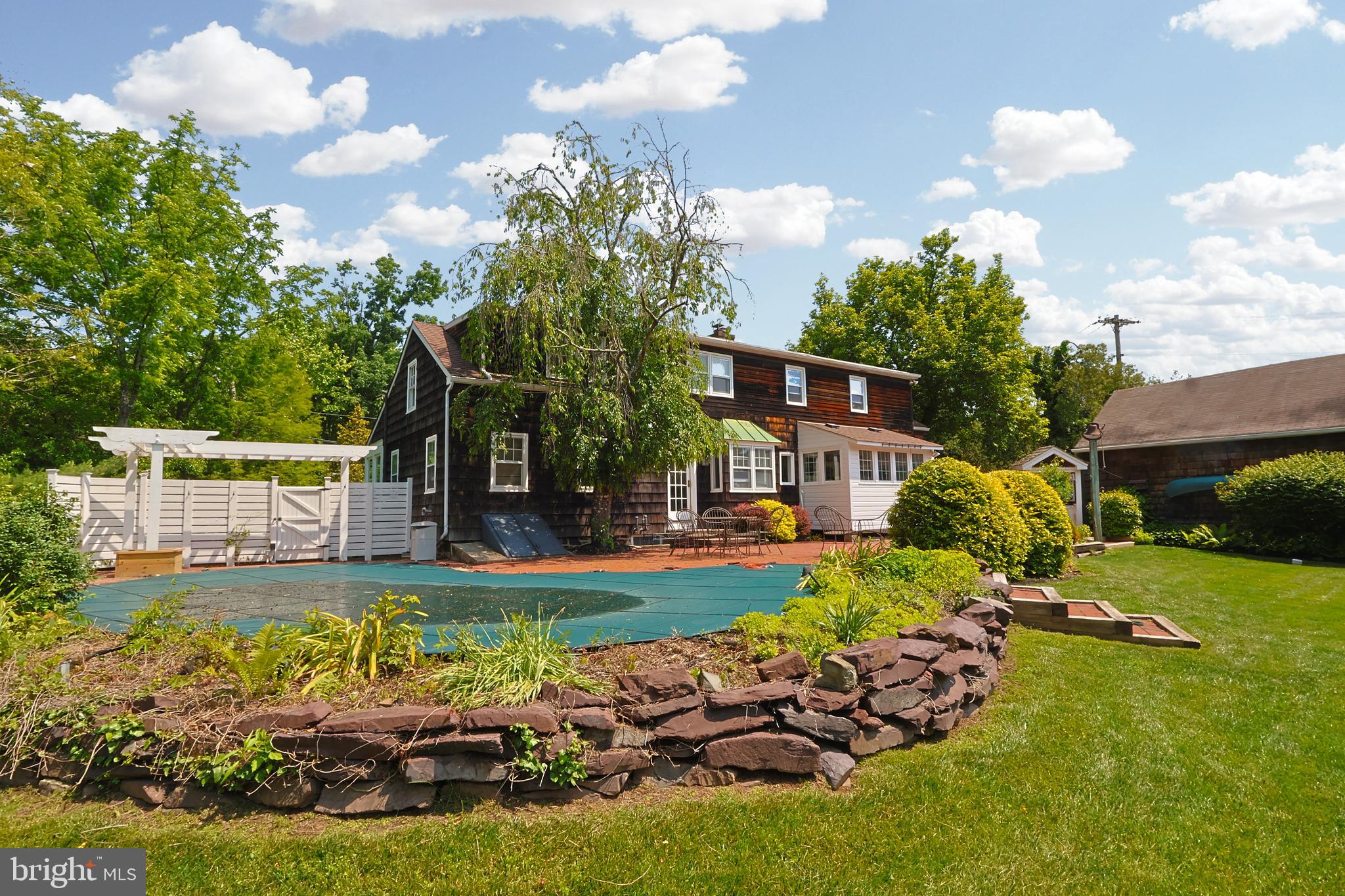 726 Forest Grove Road Furlong, PA 18925 - Photo 6 of 42 Inground Pool and expanded patio
