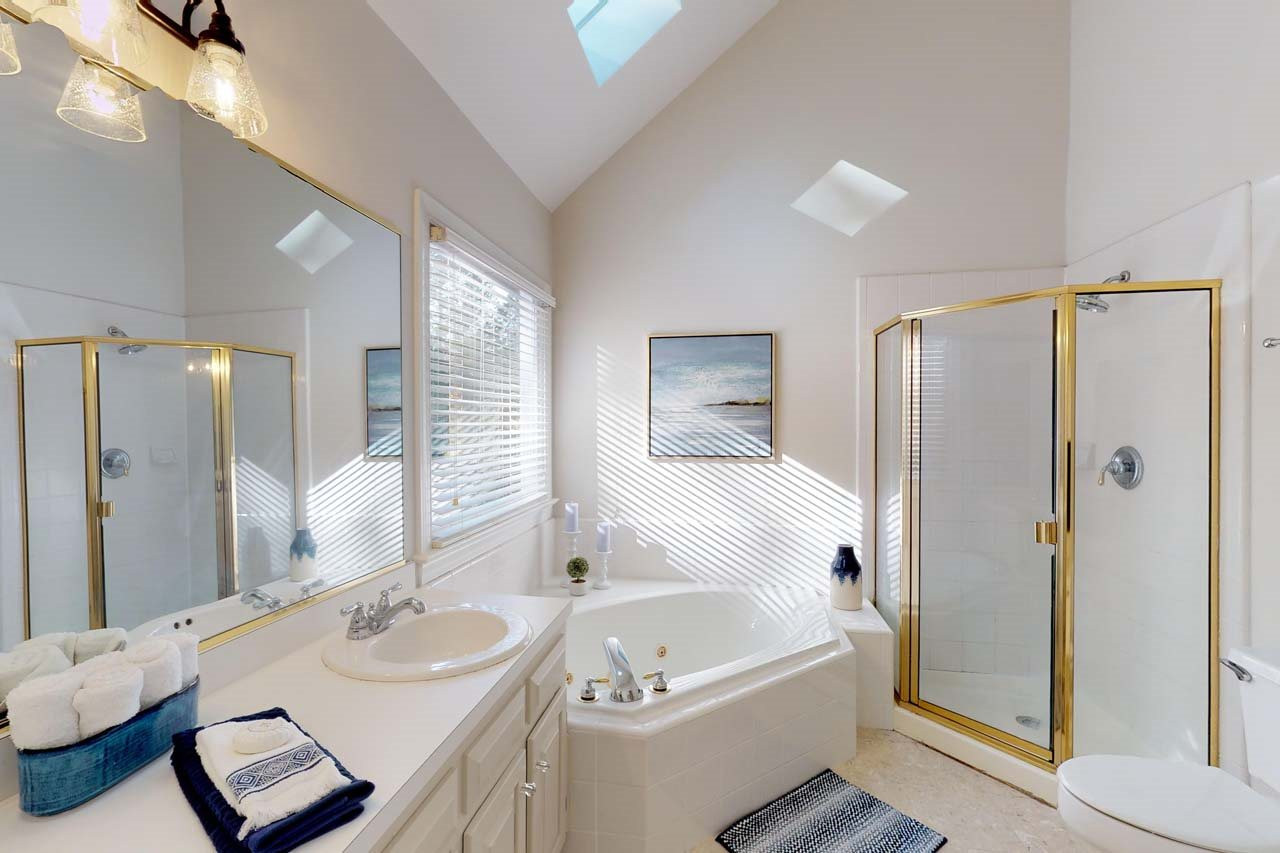8601 Stanton Place Raleigh, NC 27615 - Photo 14 of 25 This master bath features two small skylights as well as a large window which makes for a bright and welcoming space. Find relaxation in this spa tub. Master Bath
