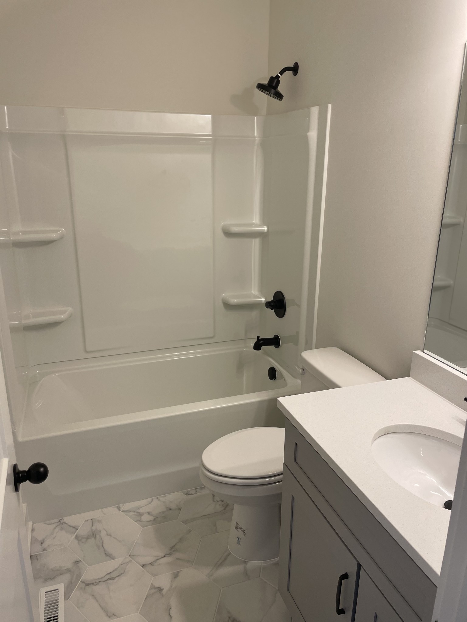 237 Tom Ferrell Road Portland, TN 37148 - Photo 8 of 10 a bathroom with a sink a toilet and a bathtub